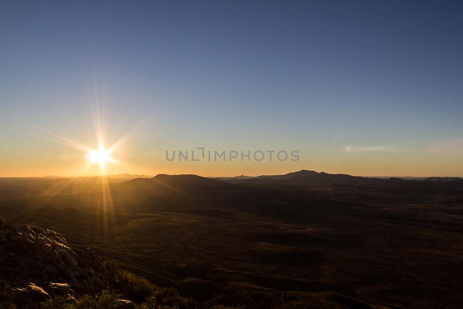 sunset view from the the top of Mount Sonder just outside of Alice Springs, West MacDonnel National Park, Australia by bettercallcurry