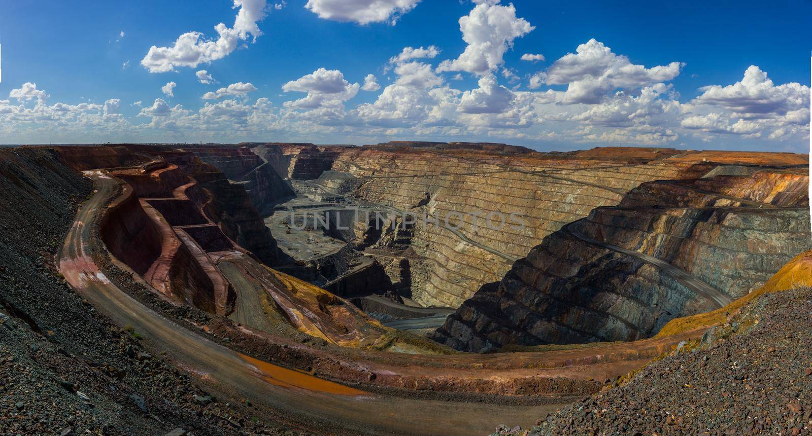 the biggest australian gold mine - super pit in Kalgoorlie, Western Australia, on a sunny summer day.