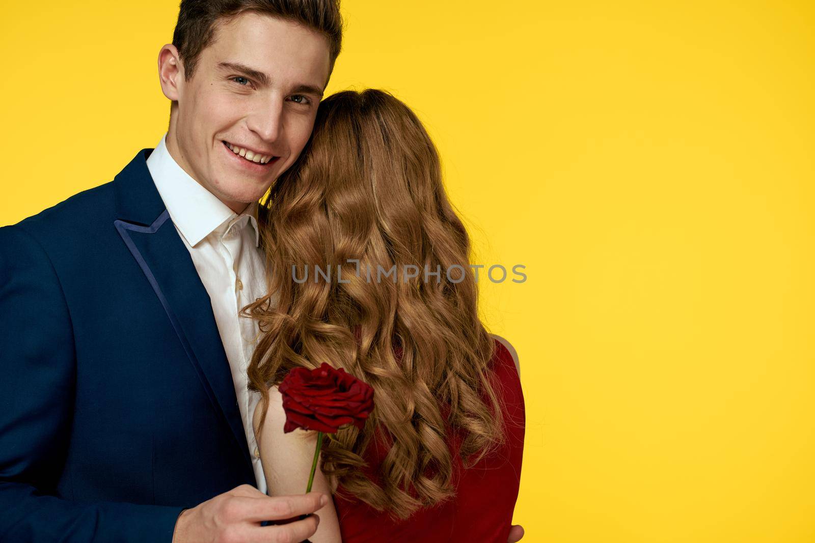 Cute couple dating hug romance yellow background by SHOTPRIME