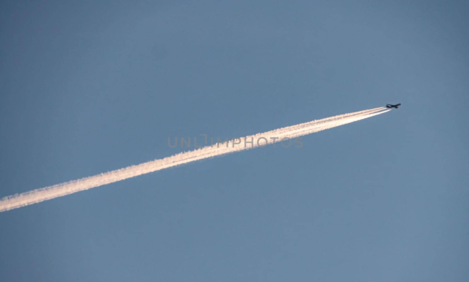 Jet of airplane line at the sky