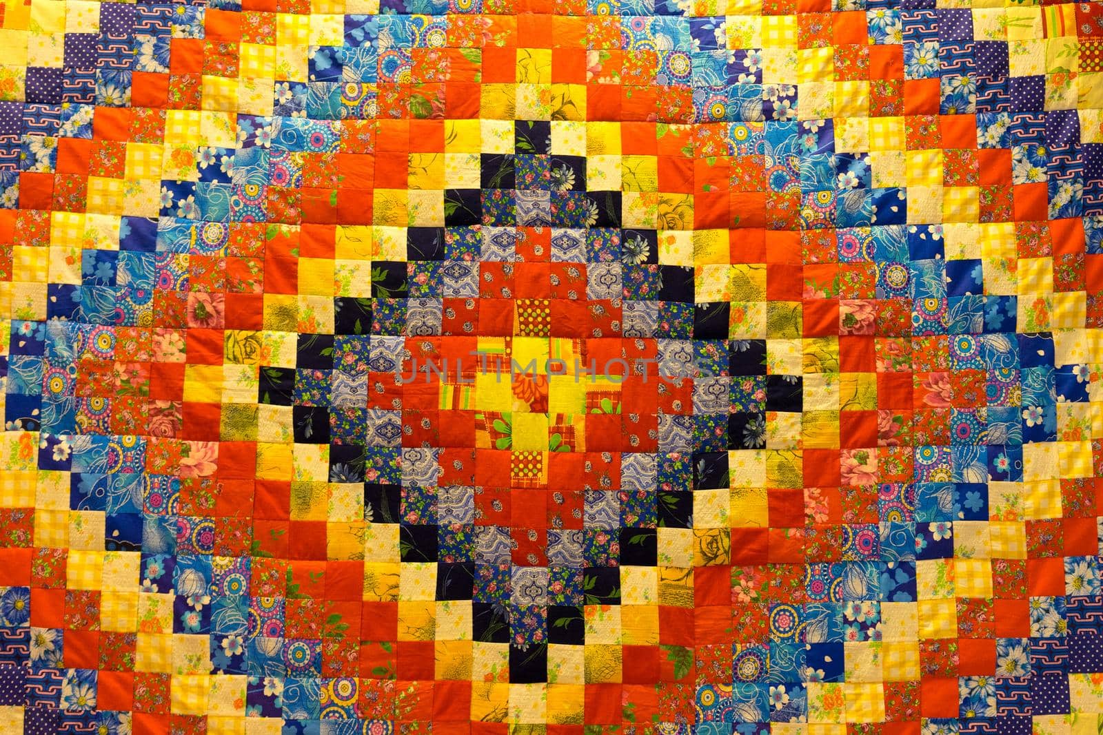 mottled background in patchwork fabrics of different colors