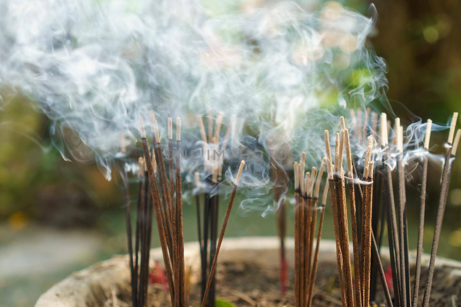 burning aromatic incense sticks. Incense for praying hindu and buddha