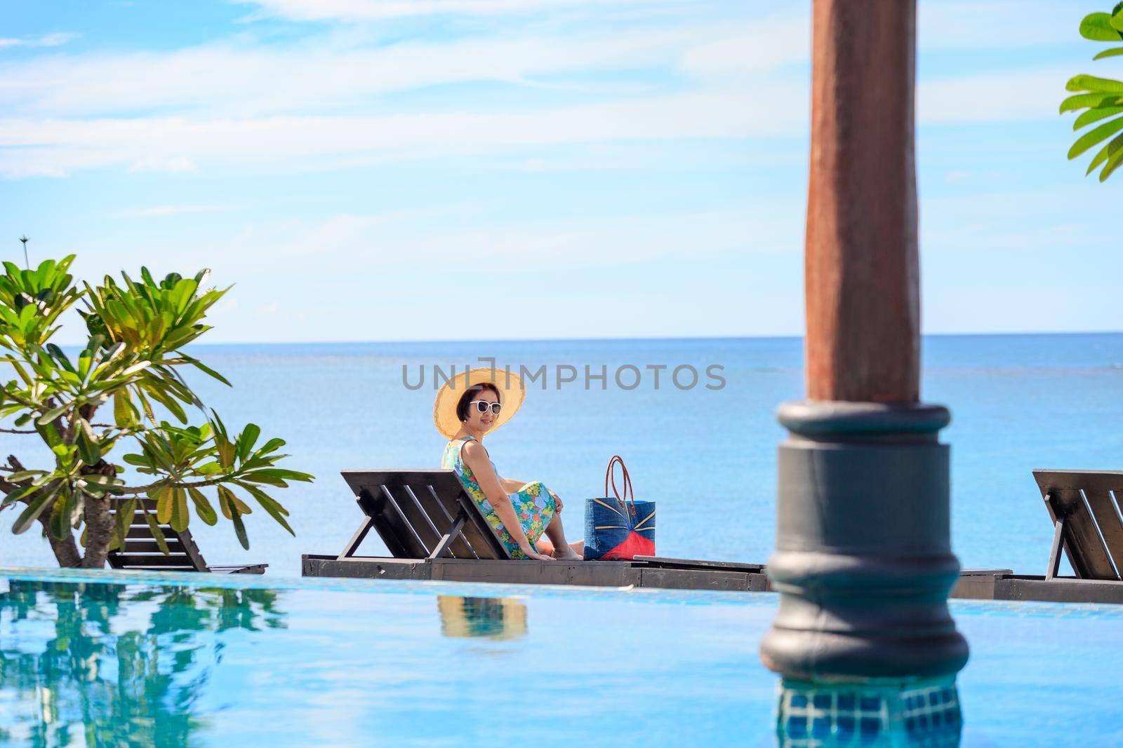 Middle aged woman relaxing at lamai beach in koh samui ,Thailand.