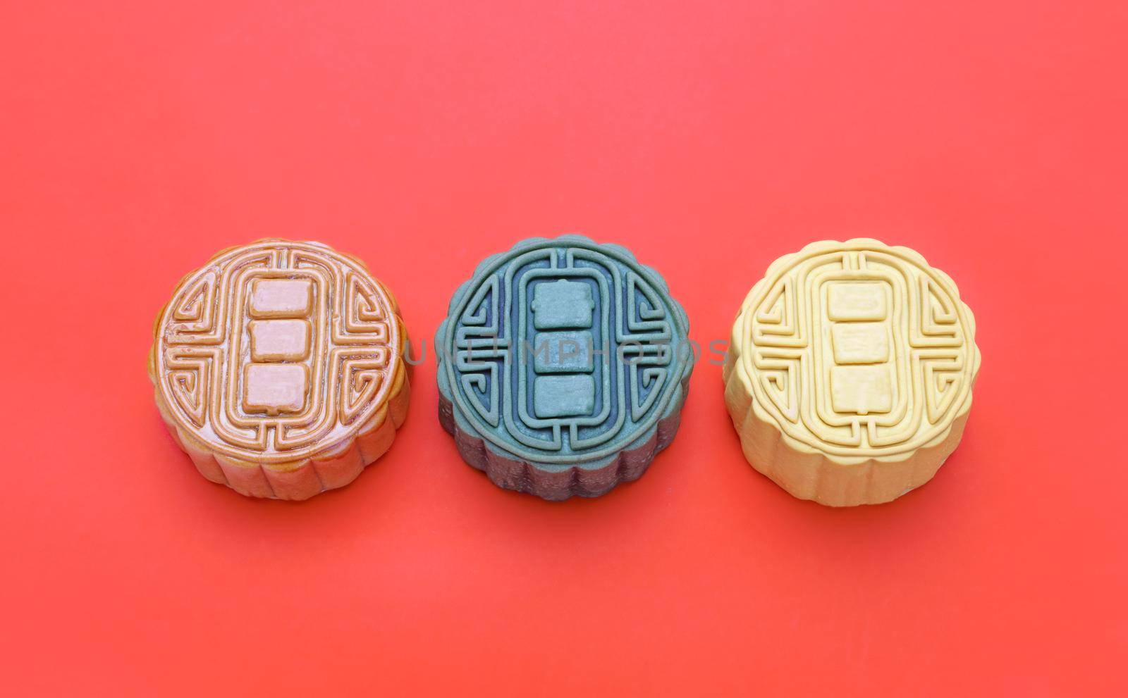 Traditional Mooncake On red background by toa55