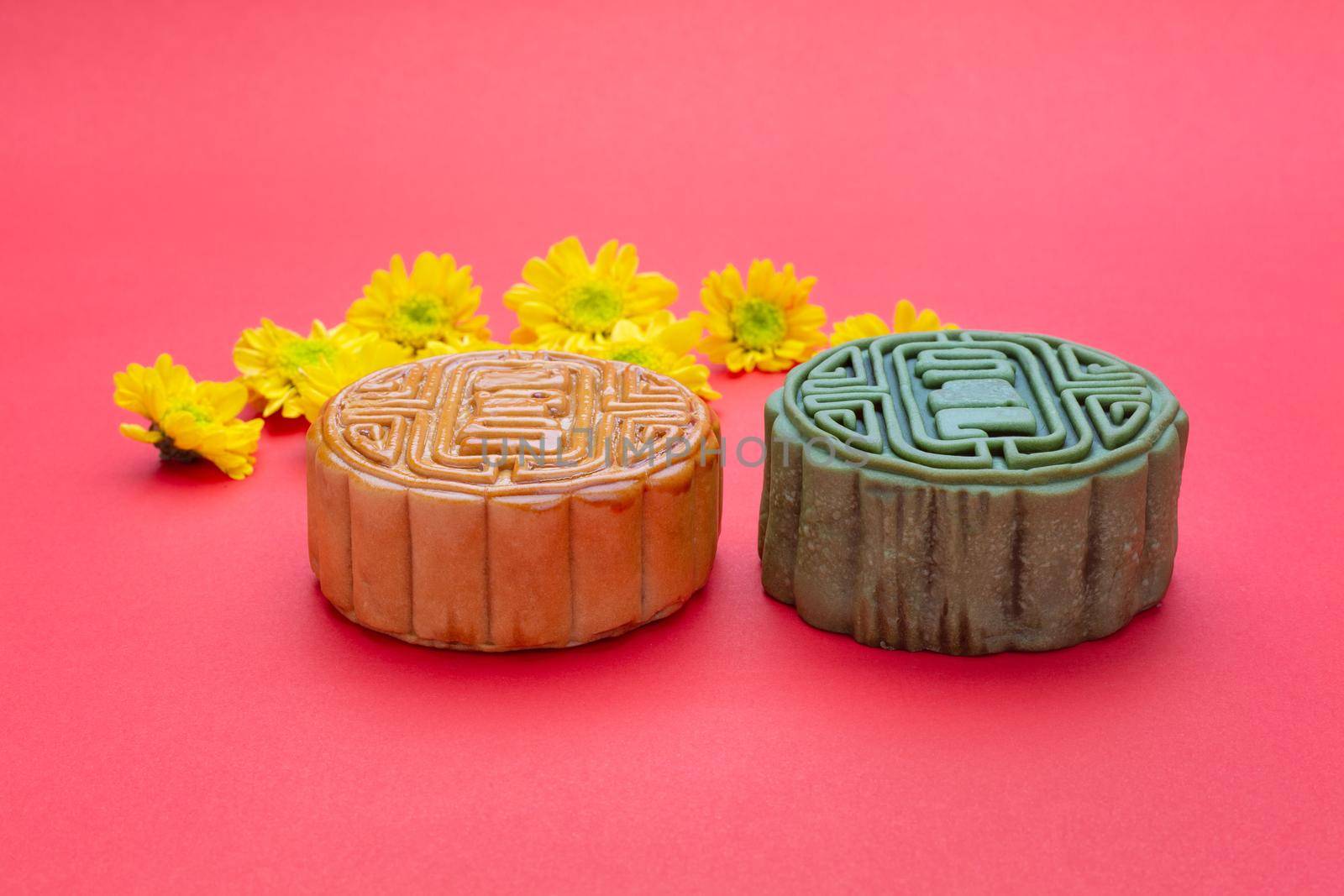 Traditional Mooncake On red background by toa55