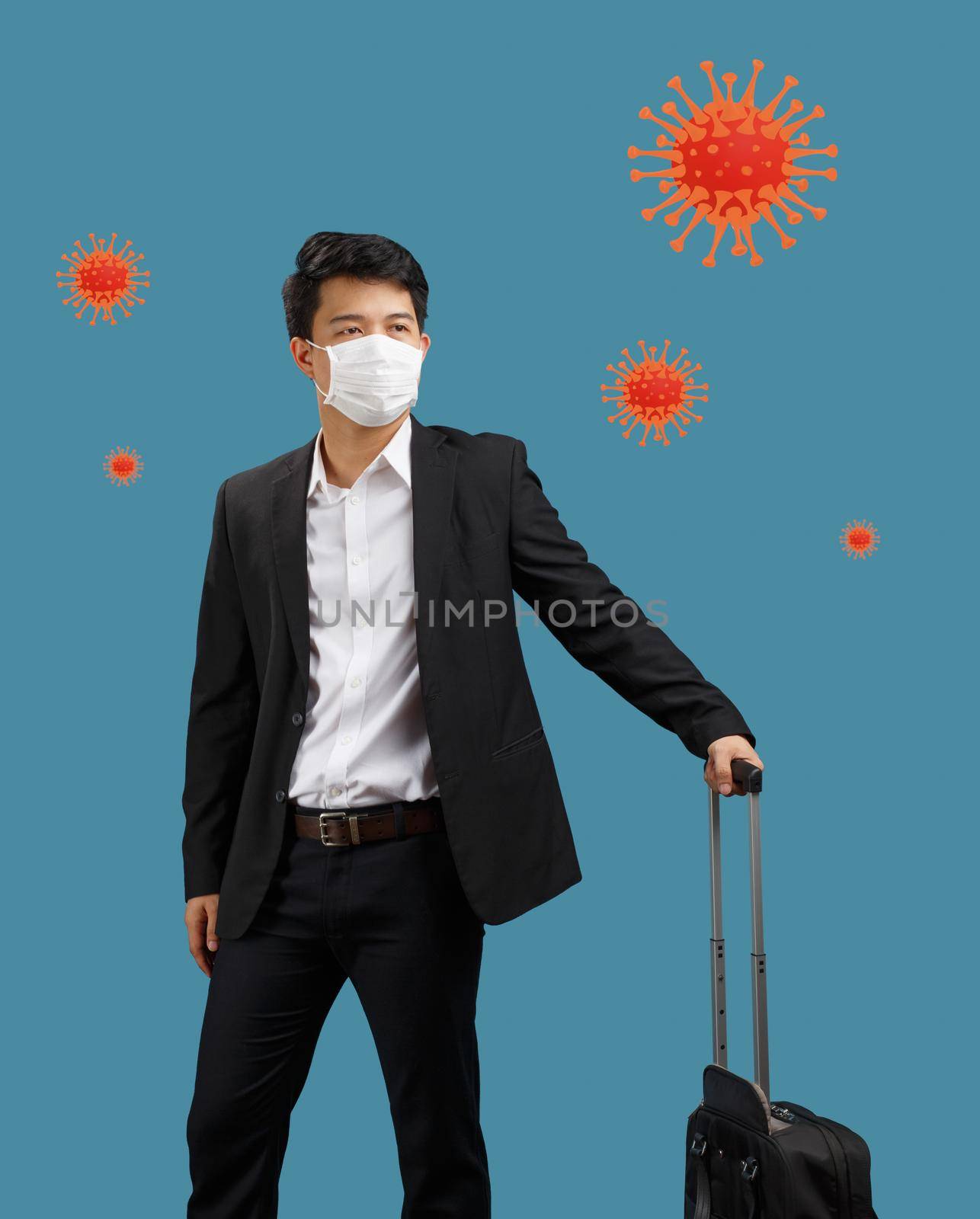 New normal lifestyle ,Business man travelling and wearing face mask protect coronavirus covid-19 by toa55