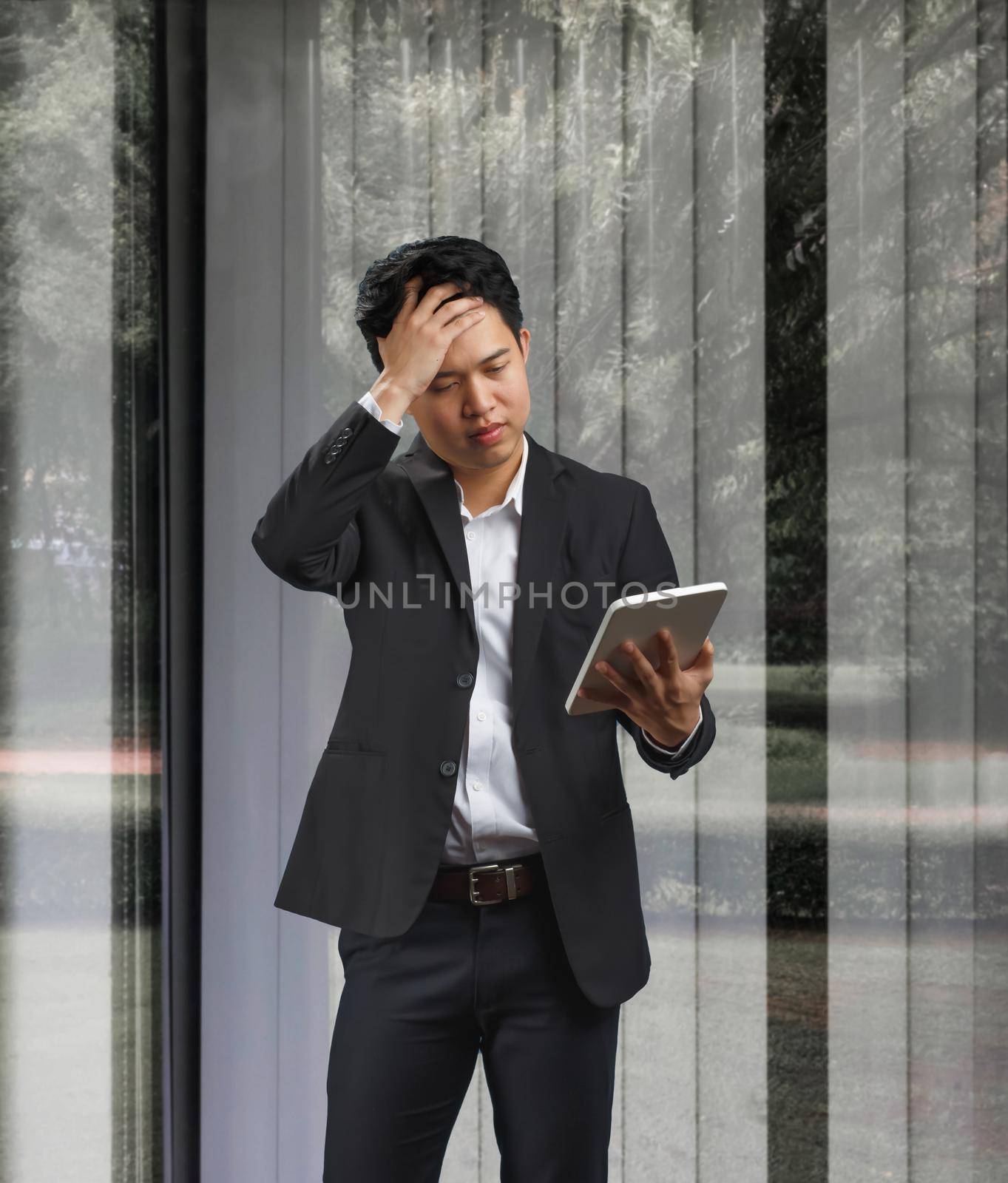 Declining Sales Growth , young business man reading document of decline in sales after Covid-19 pandemic