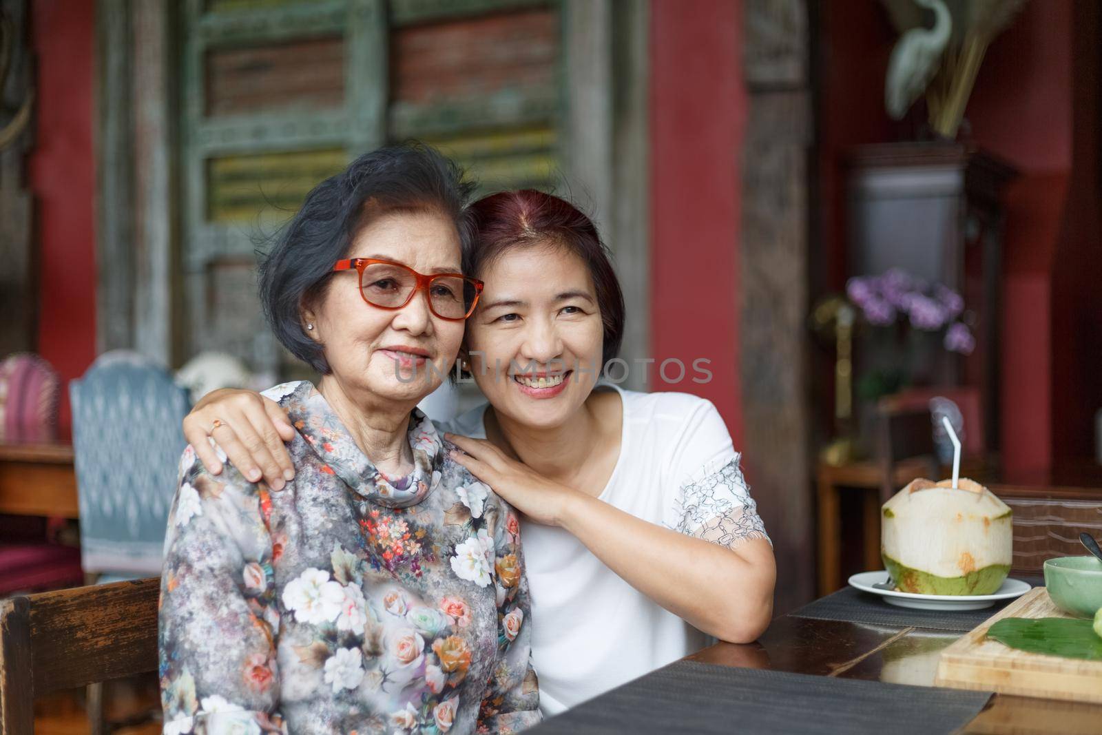 Senior asian woman with daughter relaxing on vacation together in mothers day.