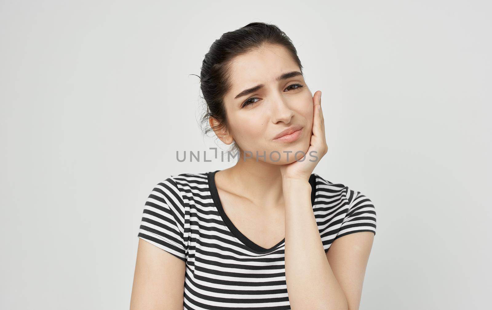 woman holding face health problems teeth pain medicine. High quality photo