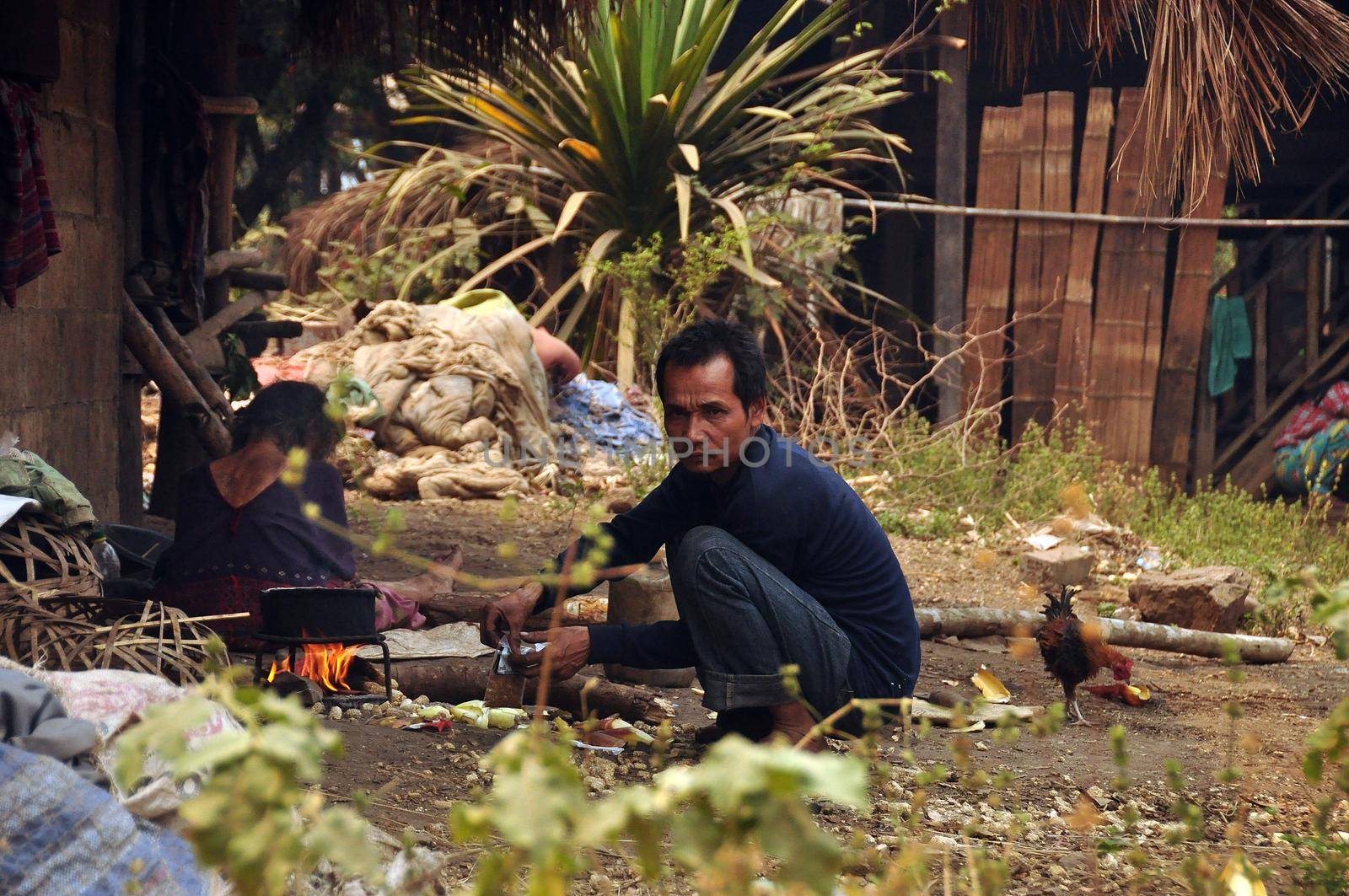 CHIANG MAI, THAILAND - MARCH 1, 2013: People living in poor village. View of lifestyle of ethnic people living in traditional tribe oriental village. Nothern tribes - Akha, Lisu, Karen, Lahu