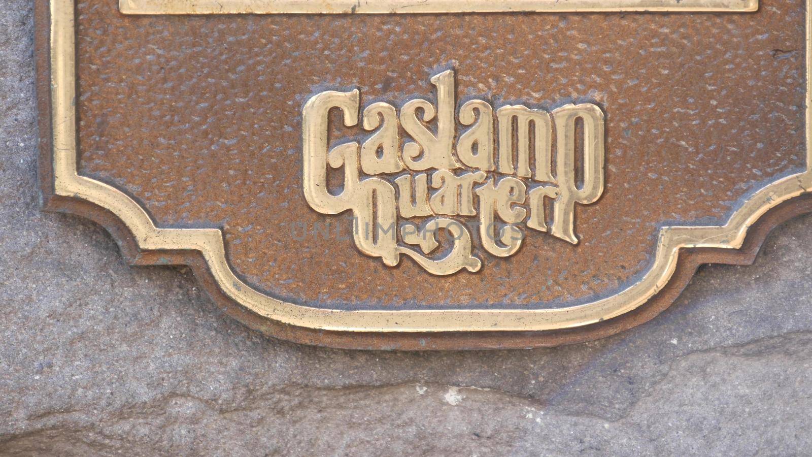 SAN DIEGO, CALIFORNIA USA - 13 FEB 2020: Historic old-fashioned Gaslamp Quarter sign on building wall. Retro signboard on 5th ave. Iconic vintage nameplate signage. Tourist landmark and sightseeing.