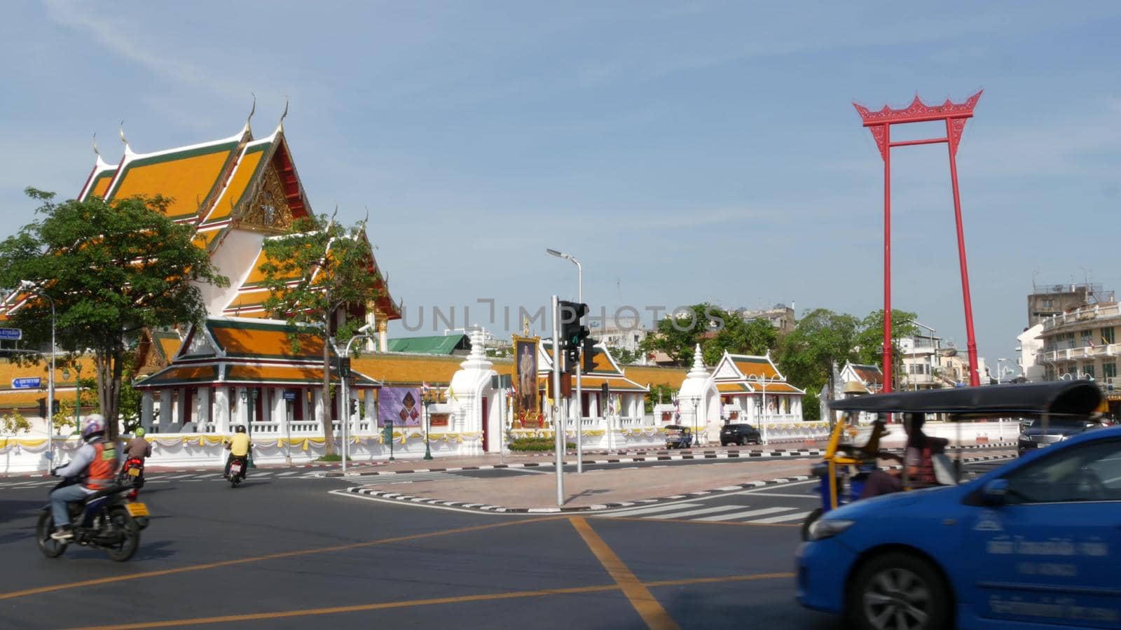 BANGKOK, THAILAND - 11 JULY, 2019: Giant Swing religios historic monument near traditional wat Suthat buddist temple. Iconic city view, cultural symbol. Famous landmark and classic tourist attraction