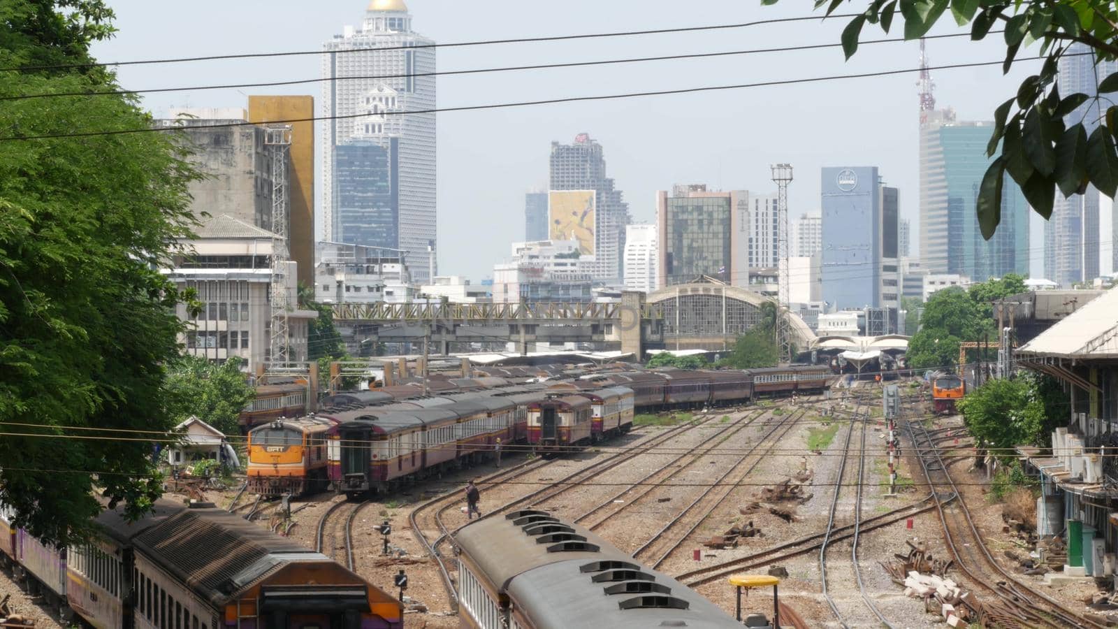 BANGKOK, THAILAND - 11 JULY, 2019: View of the train station against the backdrop of the cityscape and skyscrapers. Hua Lamphong is the hub of public transportation. State railway transport in Siam