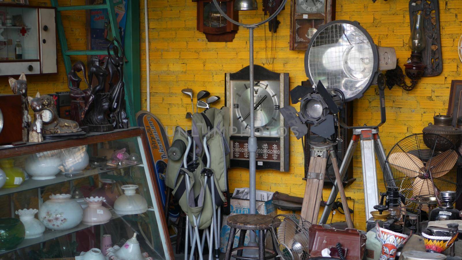 BANGKOK, THAILAND 12 JULY 2019 Rod Fai Talad retro night train market. Popular asian hipster street flea marketplace with old-fashioned vintage styled decor and second hand aged antique goods for sale by DogoraSun