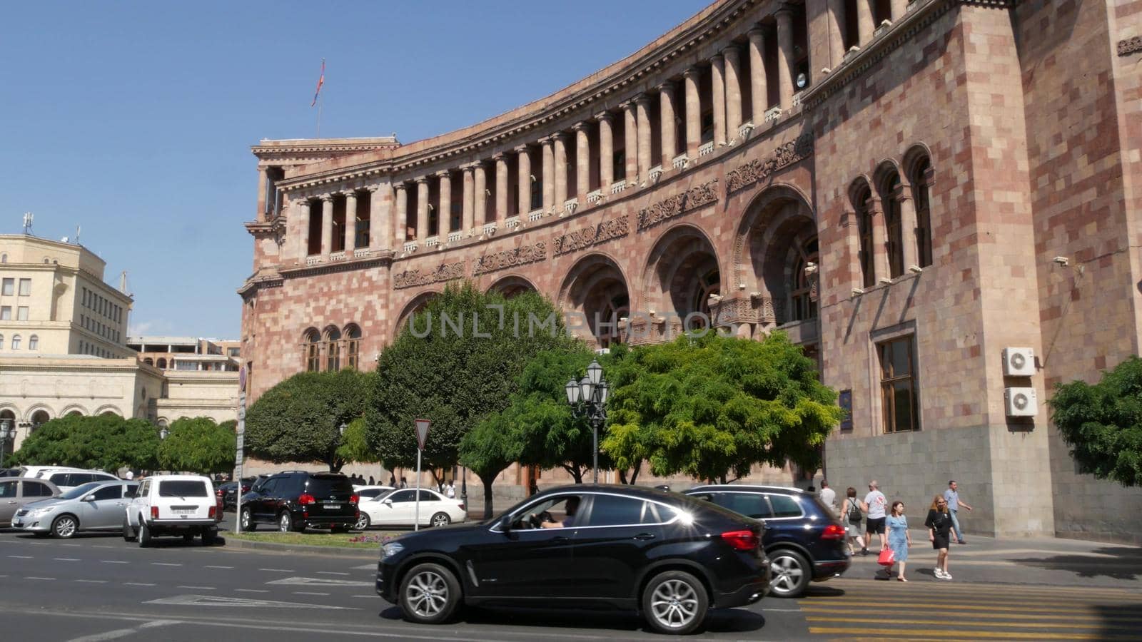 YEREVAN, ARMENIA, CAUCASUS - 28 AUGUST 2019: Central Republic Square, caucasian armenian capital, soviet architectural heritage, downtown classical street city life on sunny day. Kentron architecture.