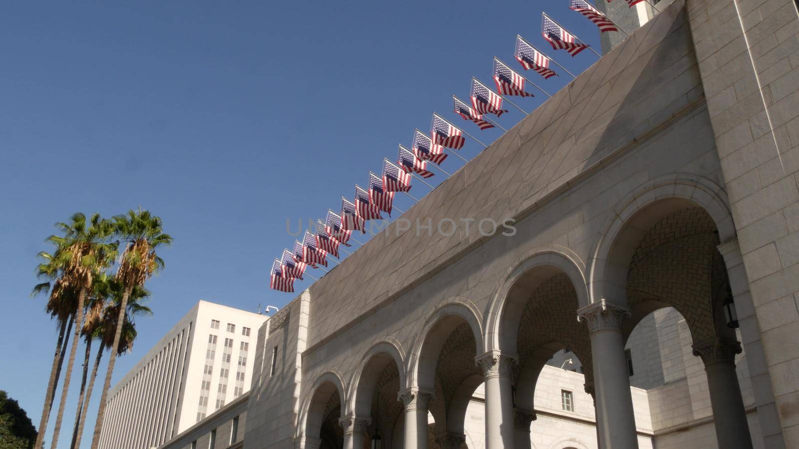 LOS ANGELES, CALIFORNIA, USA - 30 OCT 2019: City Hall highrise building exterior in Grand Park. Mayor's office in downtown. Municipal civic center, federal authority, headquarters of government in LA by DogoraSun