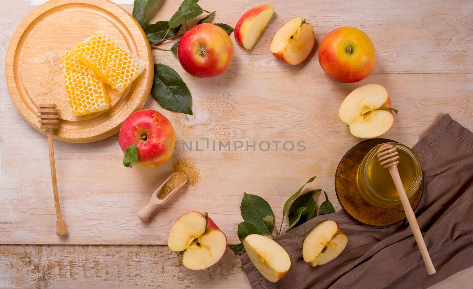 Jewish holiday Rosh Hashana background with apples, honey on blackboard. View from above. Flat lay