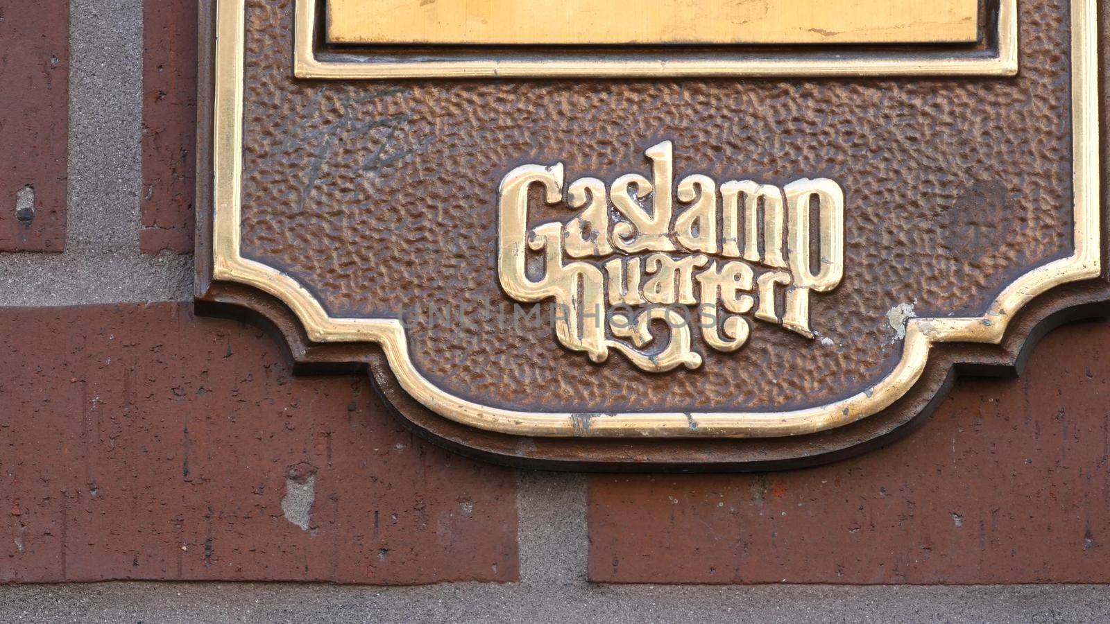 SAN DIEGO, CALIFORNIA USA - 13 FEB 2020: Historic old-fashioned Gaslamp Quarter sign on building wall. Retro signboard on 5th ave. Iconic vintage nameplate signage. Tourist landmark and sightseeing by DogoraSun