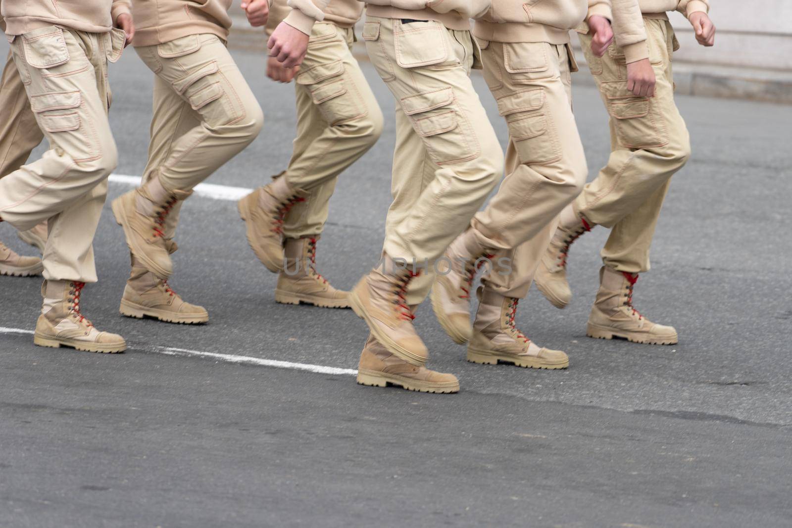 People in light military uniforms are on the road systems. Vladivostok, Russia
