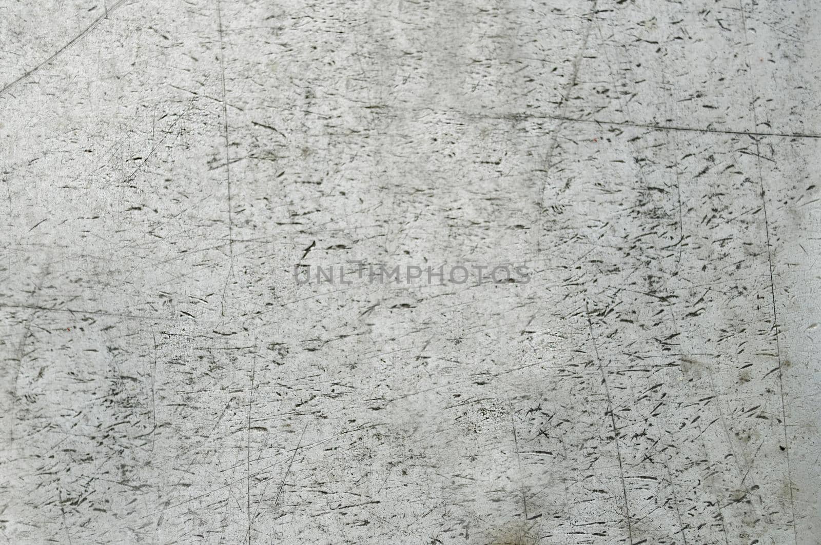 The old concrete wall is gray with scratches on the surface of the close-up.Texture or background