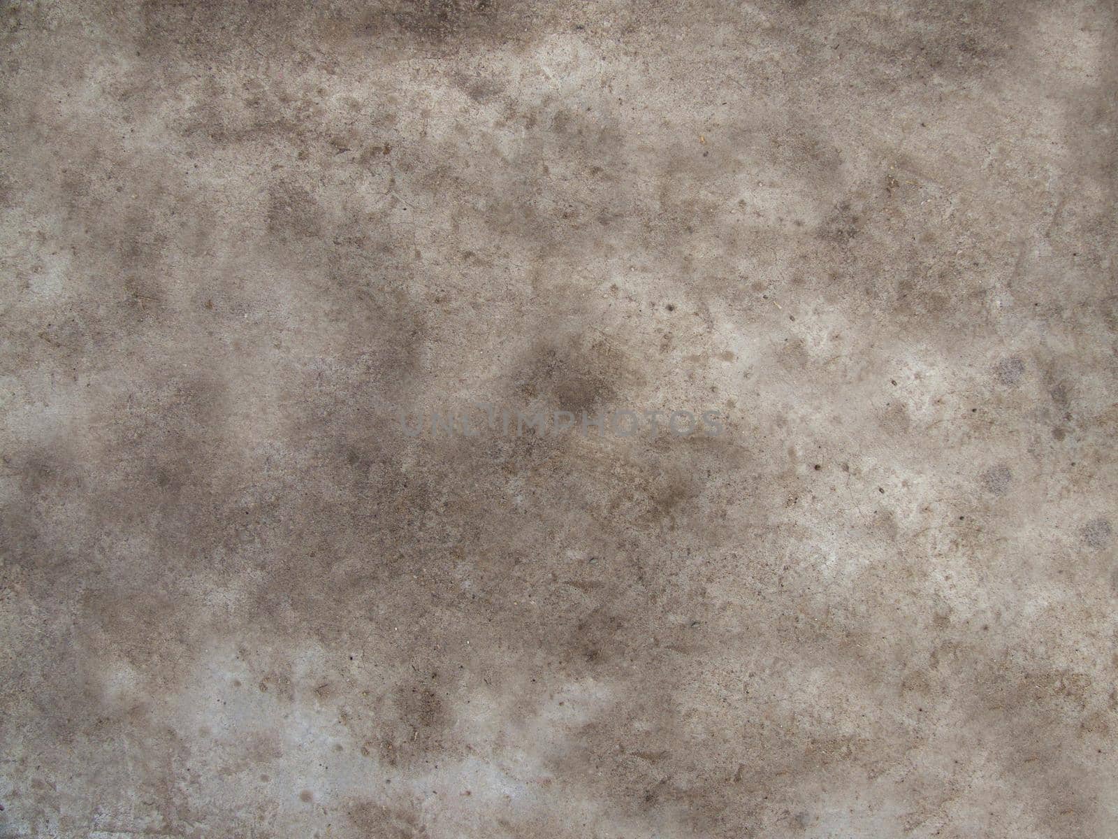 Old damaged wall with spots and roughness on the surface.Texture or background