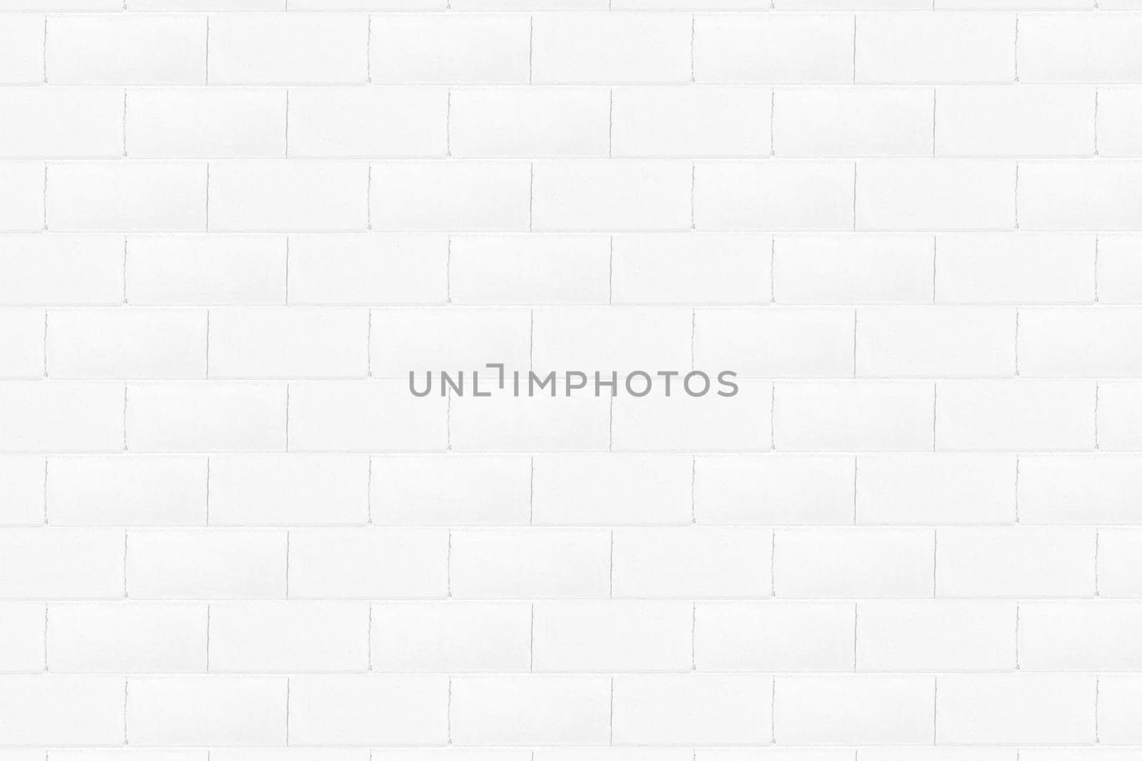 Decorative wall imitation of a white brick wall close up.Texture or background