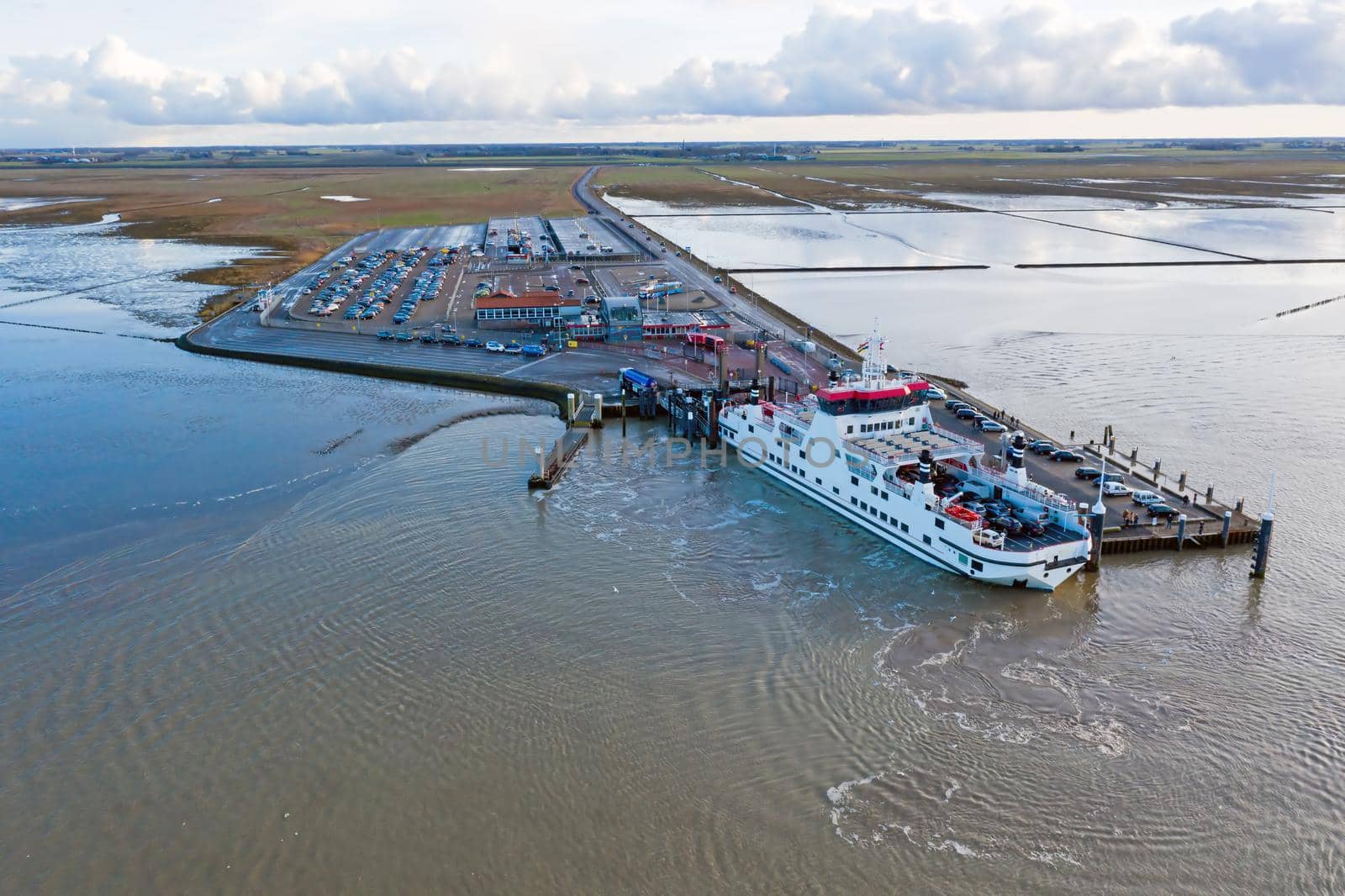 Aerial from the ferry from Ameland arriving at Holwerd in the Netherlands by devy