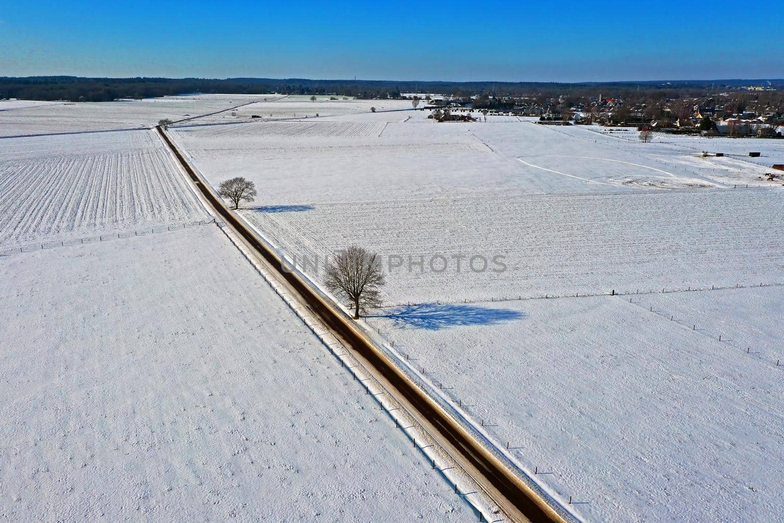 Aerial from a dutch landscape in winter in the Netherlands