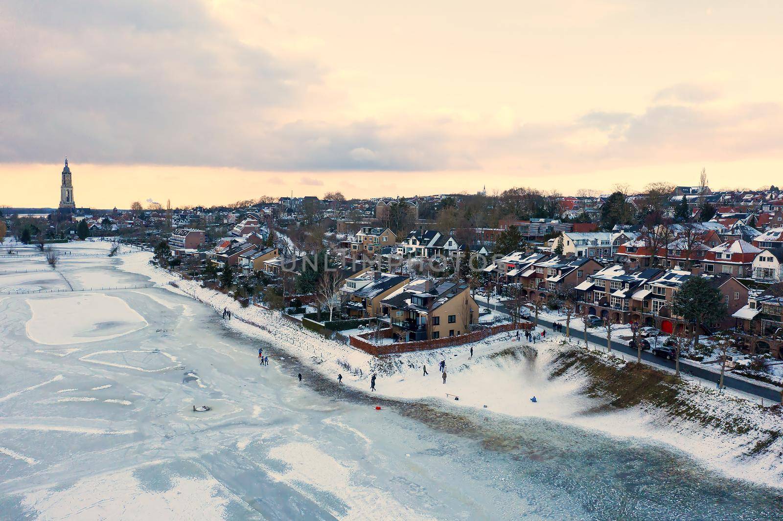 Aerial from the snowy city Rhenen in the Netherlands in winter by devy