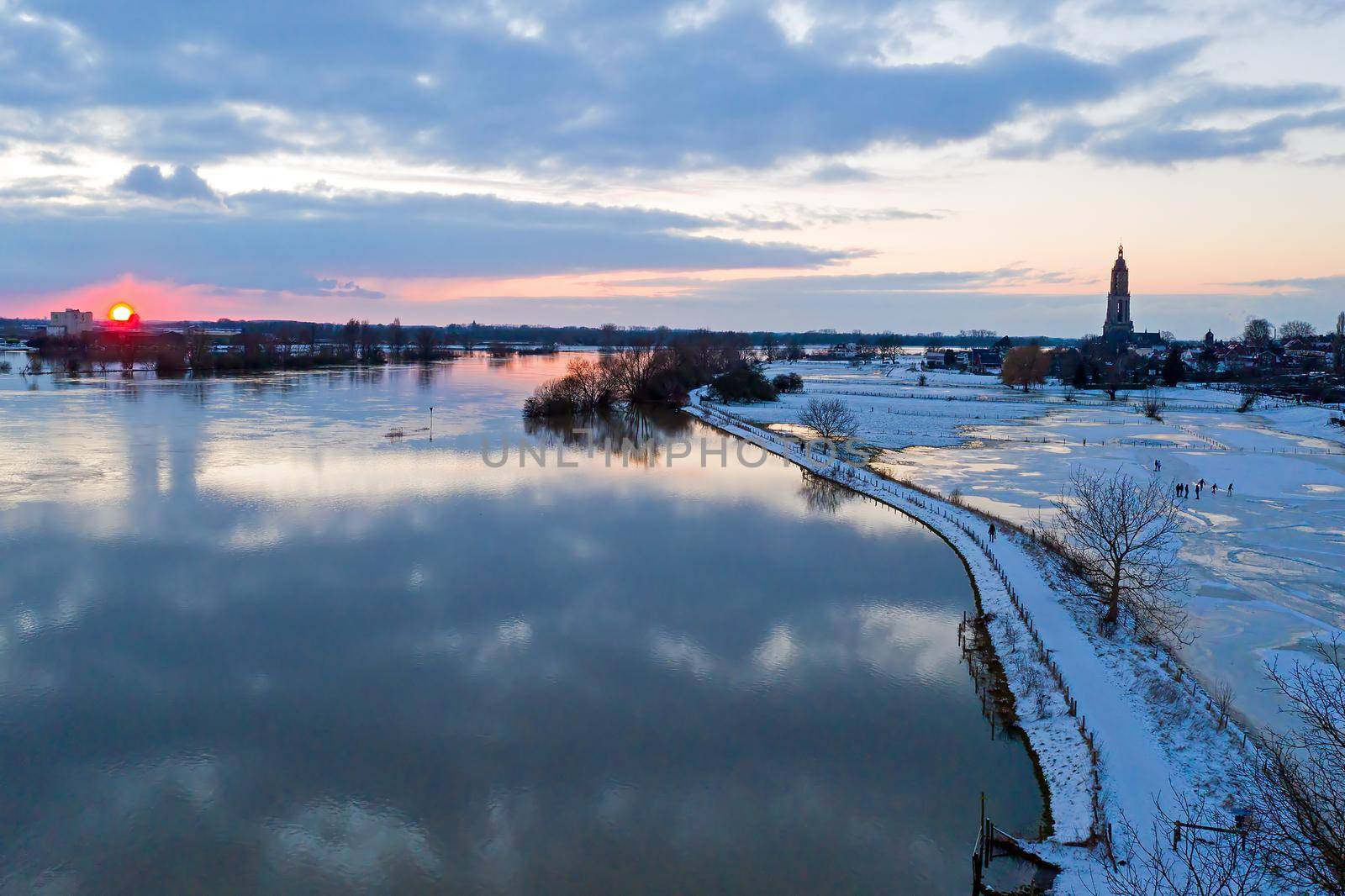 Aerial from the snowy city Rhenen in the Netherlands in winter by devy