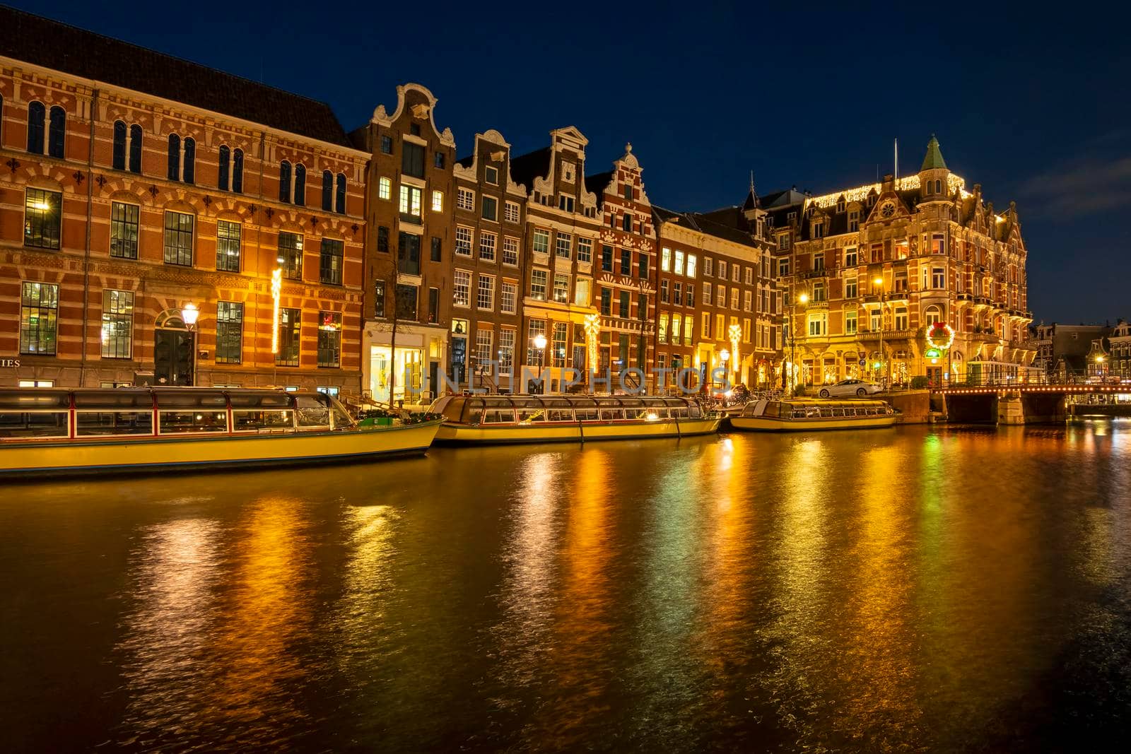 City scenic from Amsterdam by night in christms time in the Netherlands by devy