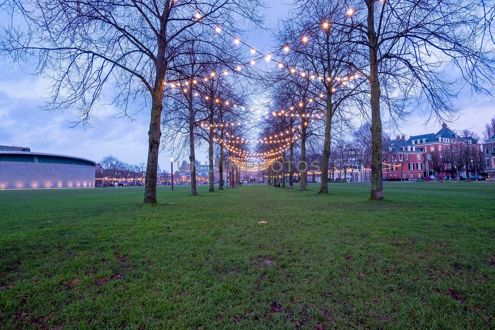 Christmas decoration at the Museumplein in Amsterdam the Neetherlands at twilight by devy