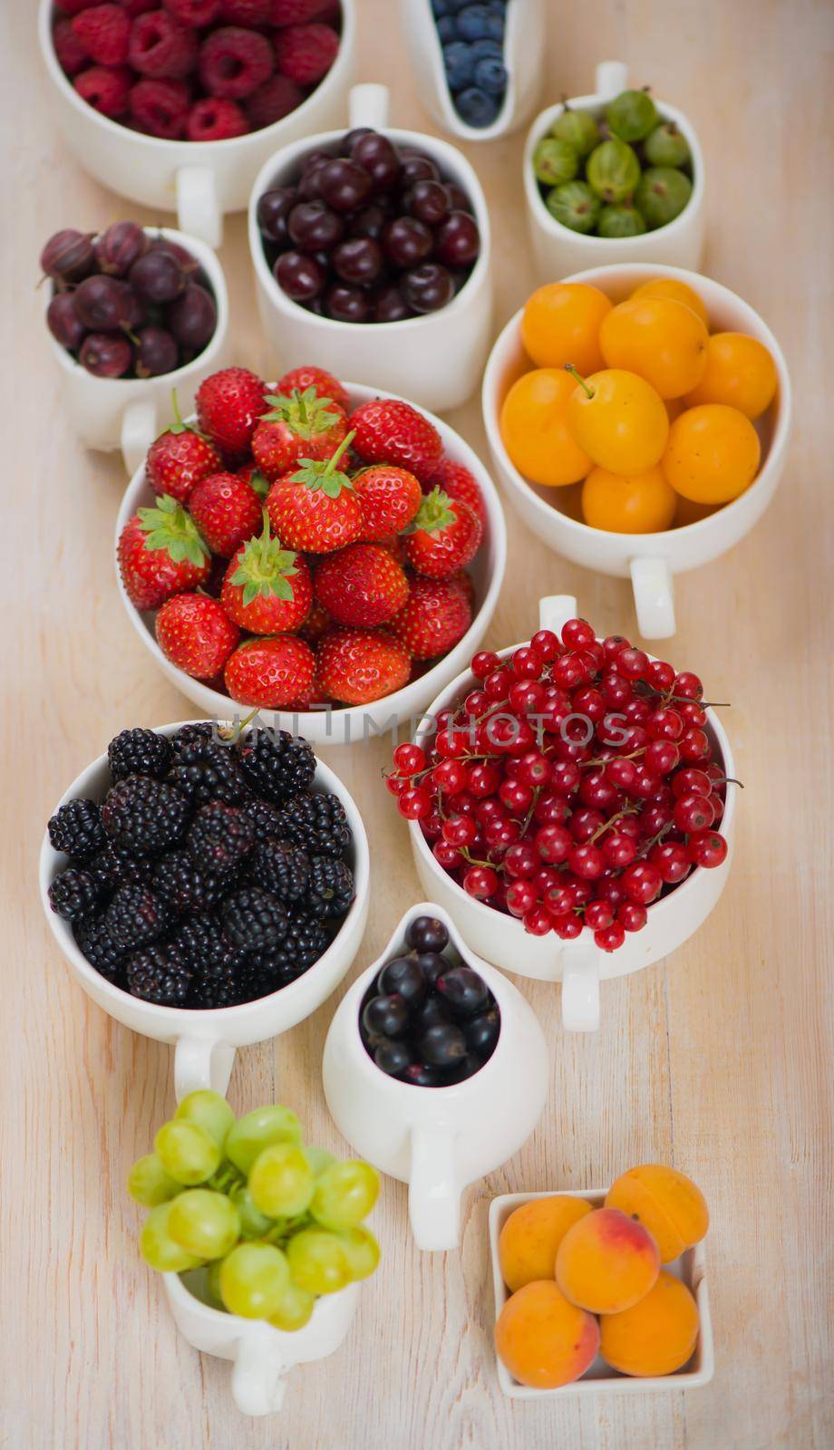 berry mix isolated on a white background by aprilphoto