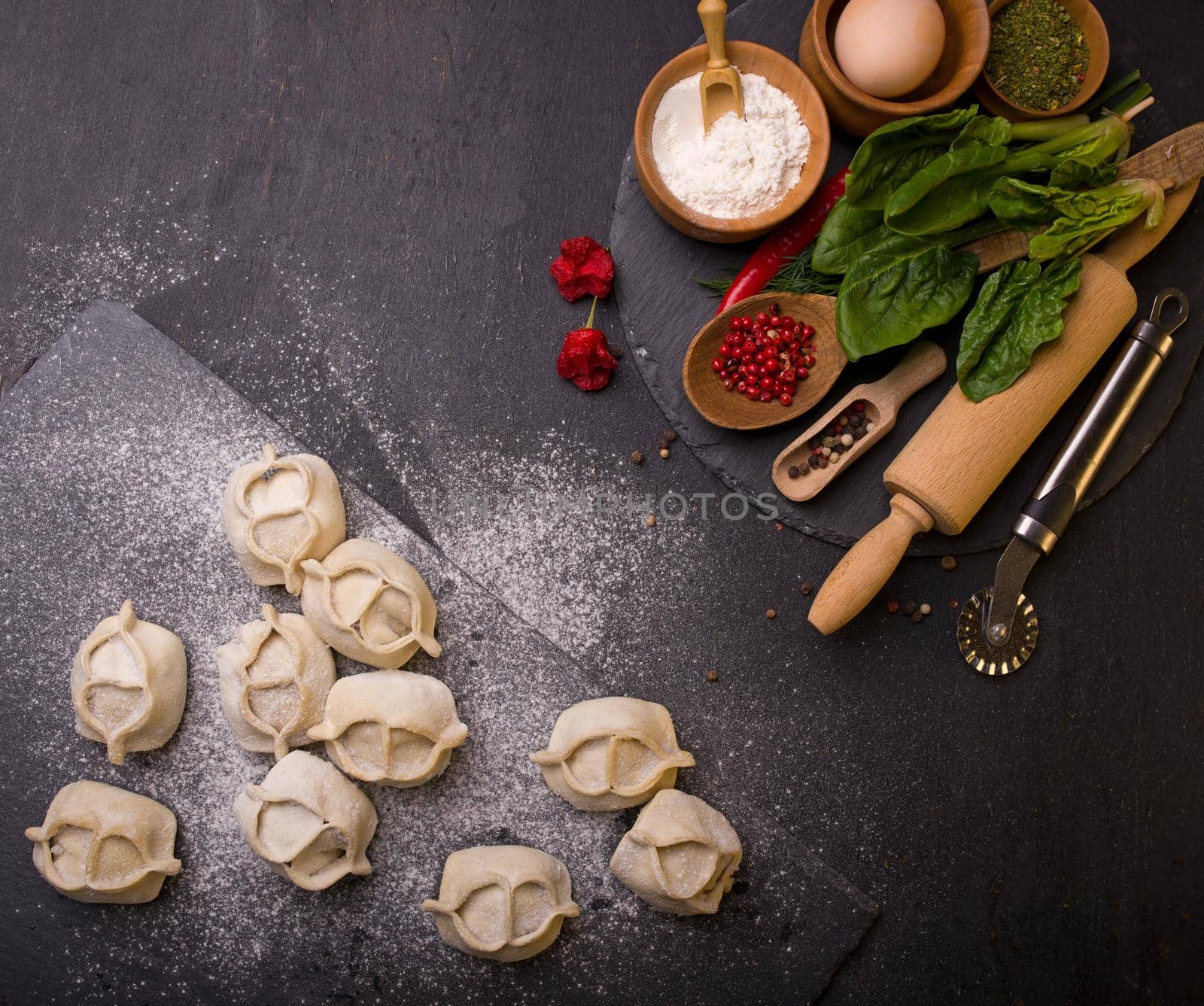 homemade frozen foods. manti with beef on a wooden table by aprilphoto