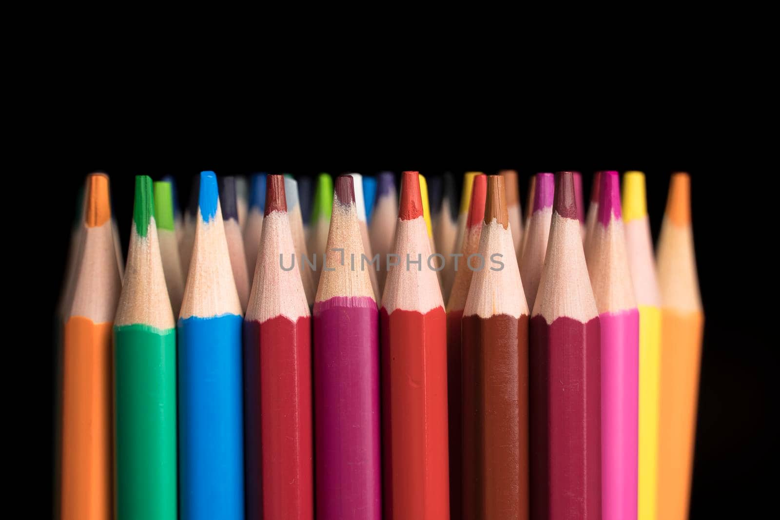 A set of colored pencils, stationery. Lots of colorful pencils on the table. Drawing and Visual Art Kits by YevgeniySam