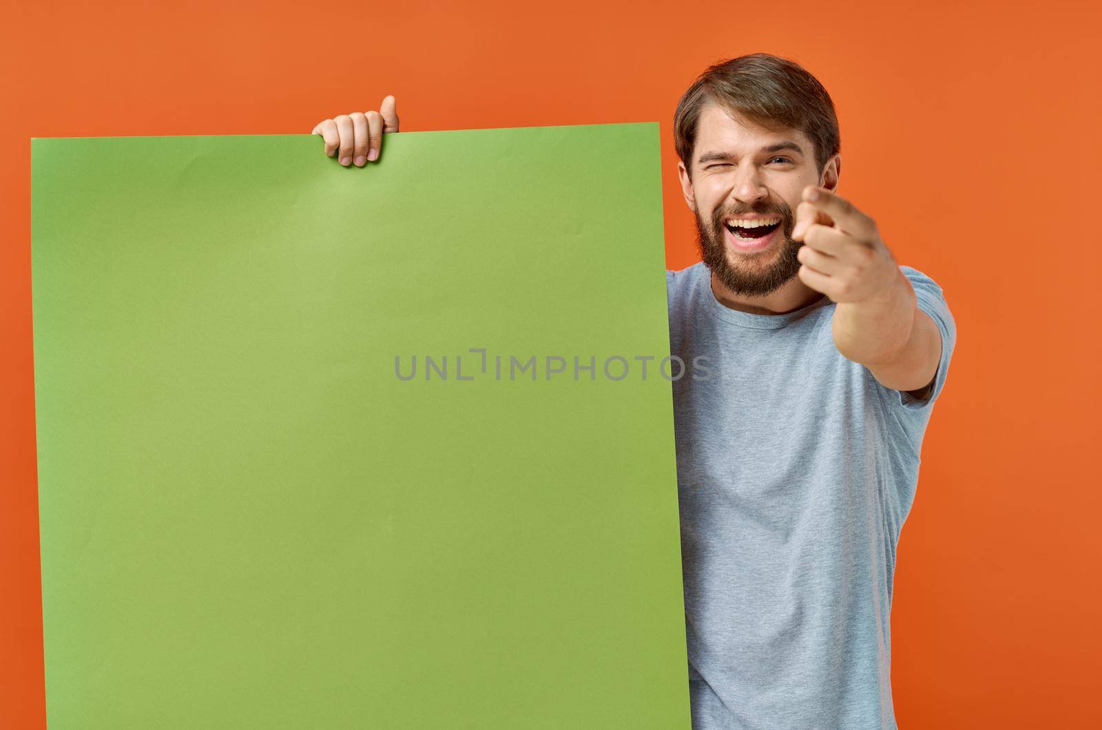 emotional man t shirts green mockup poster presentation marketing. High quality photo