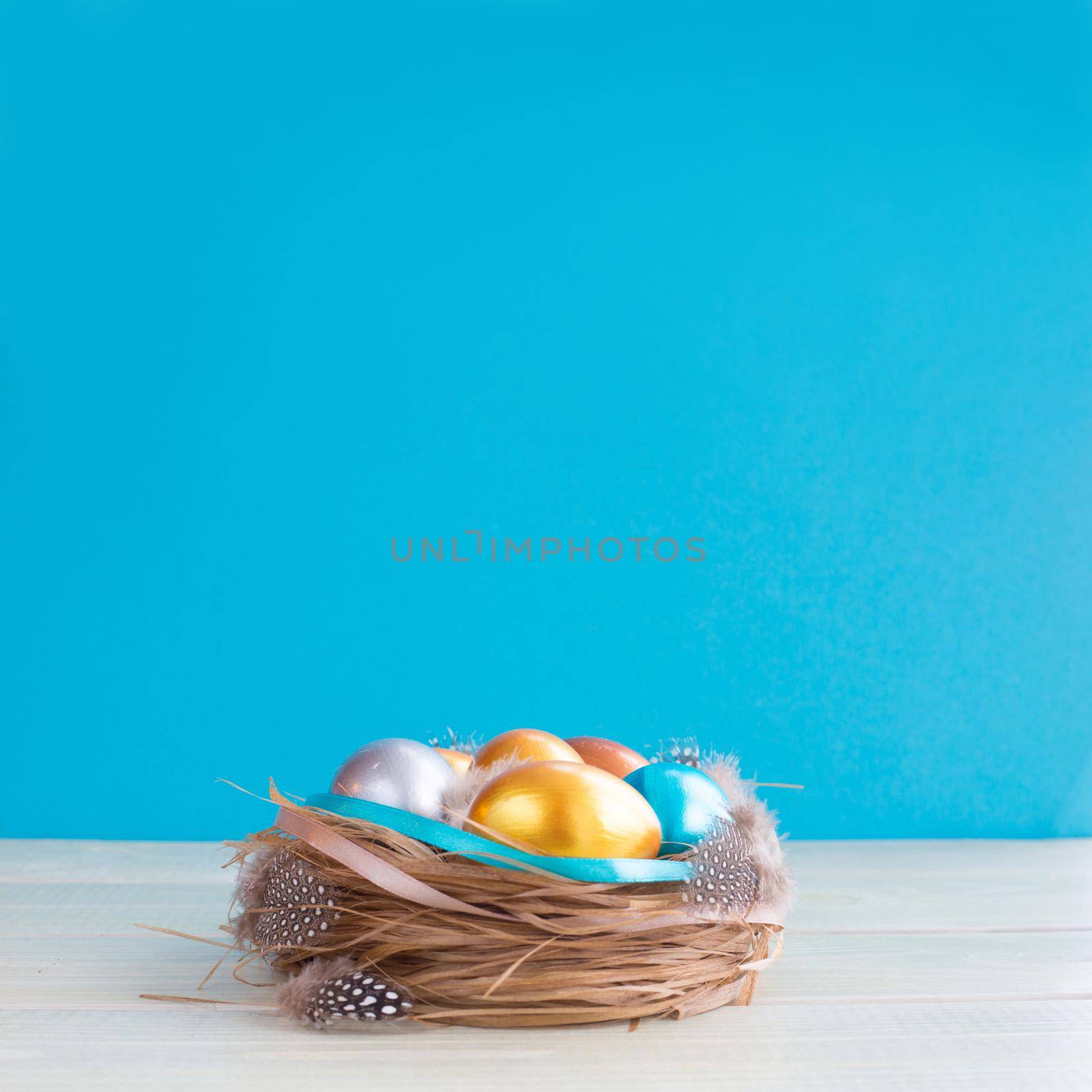 Decorated easter nest with eggs by destillat