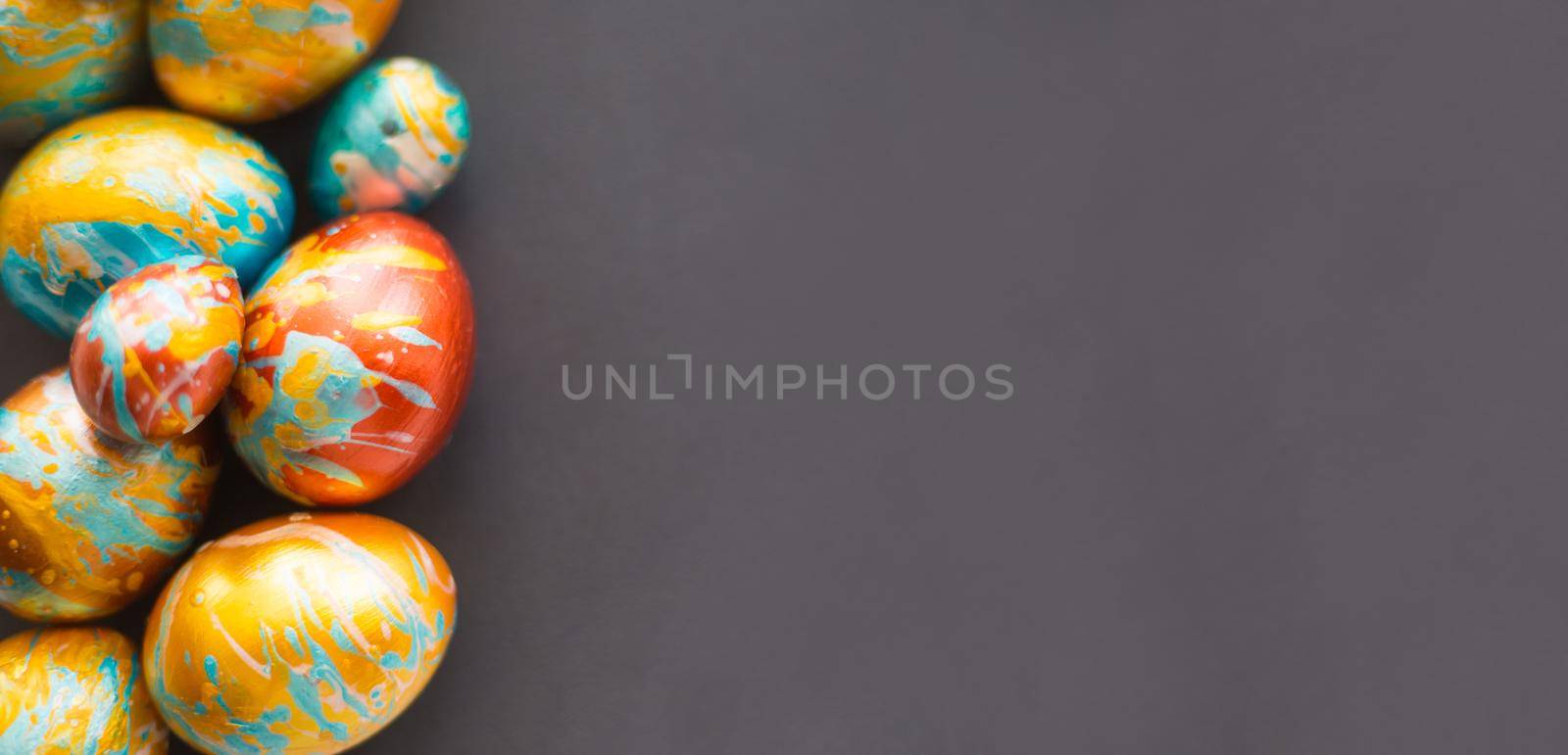 Perfect colorful handmade easter eggs on gray paper background , shape of border frame corner with copy space for text content , happy easter card