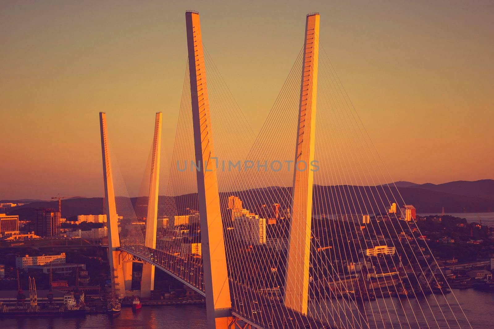 Vladivostok, Russia.Night view of the bridge of the Golden horn in summer.