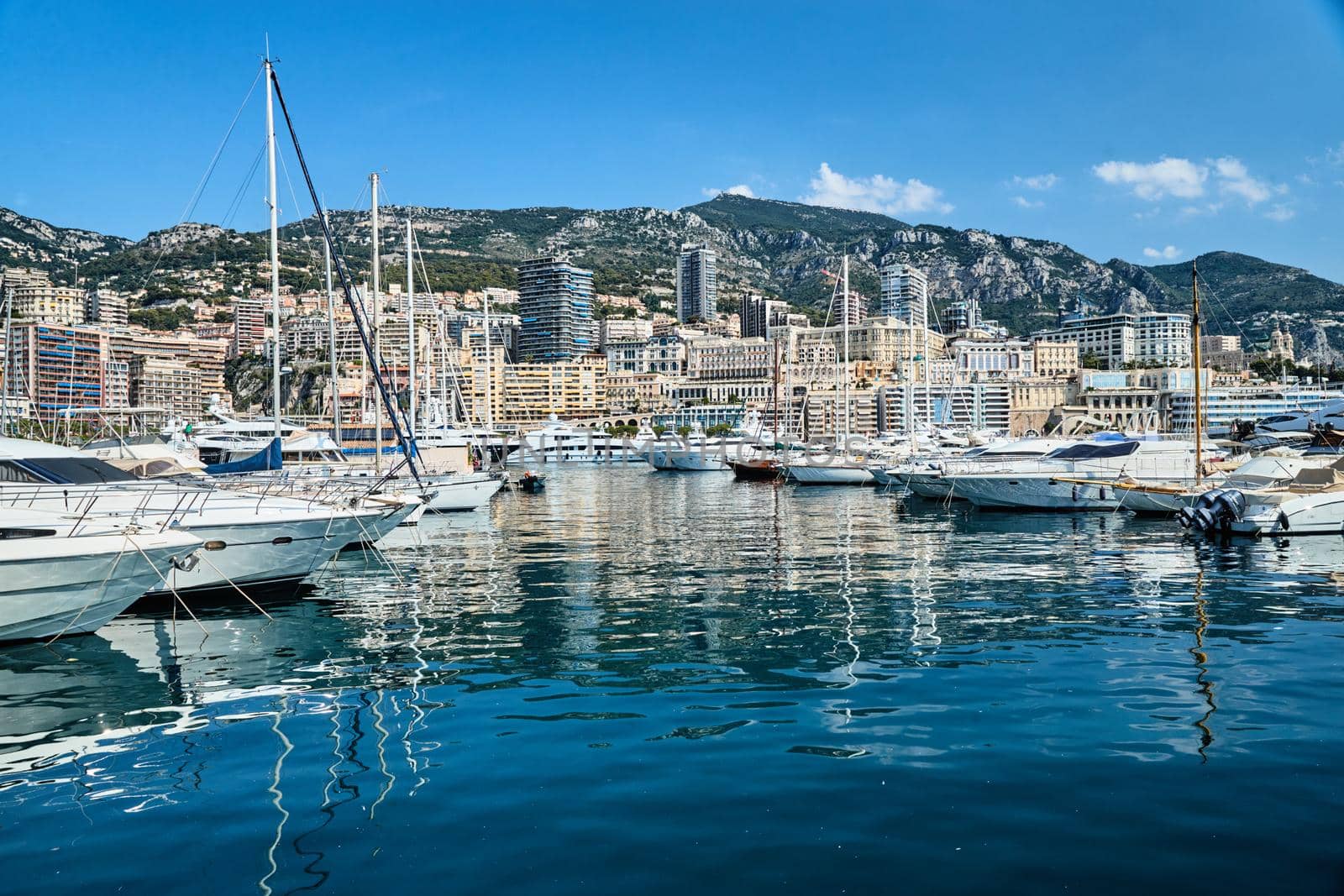 Monaco, Monte-Carlo, 06 August 2018: Tranquillity in port Hercules, is the parked boats, many yachts and boats, RIVA, Prince's Palace of Monaco, megayachts, massif of expensive real estate