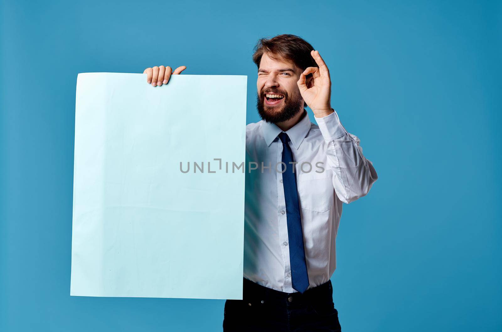 man in shirt with tie banners in the hands of an official advertising marketing. High quality photo