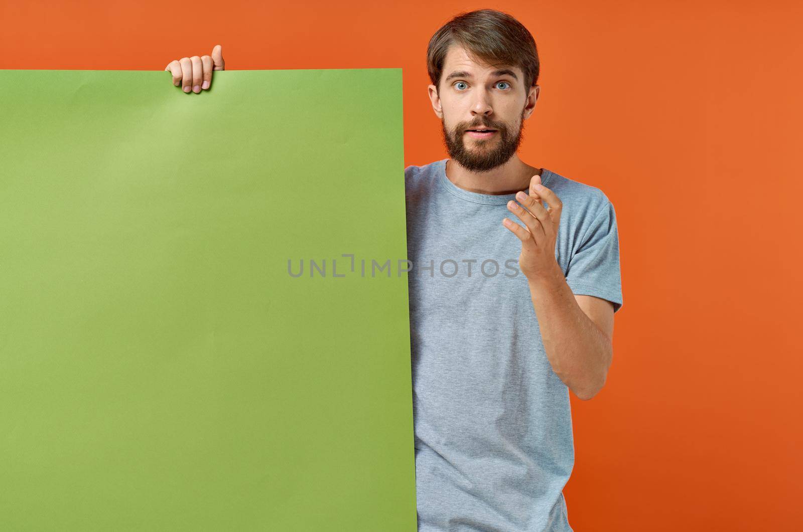 emotional man t shirts green mockup poster presentation marketing. High quality photo