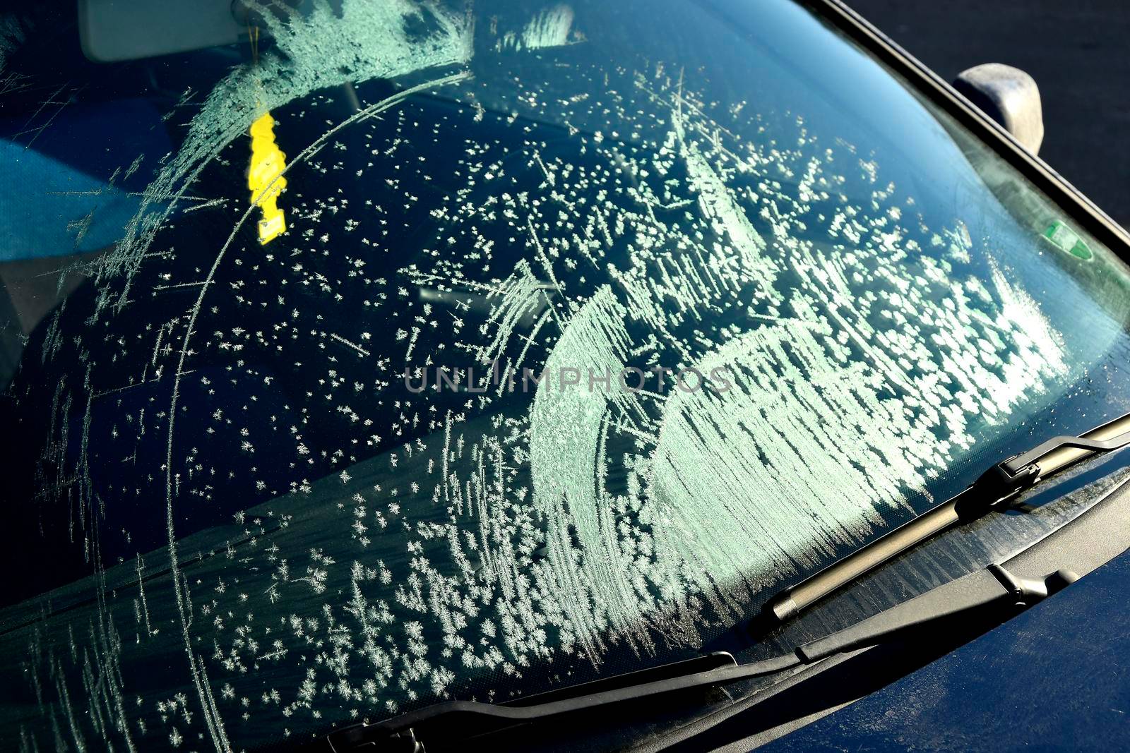 ice crystals on a car front window by Jochen