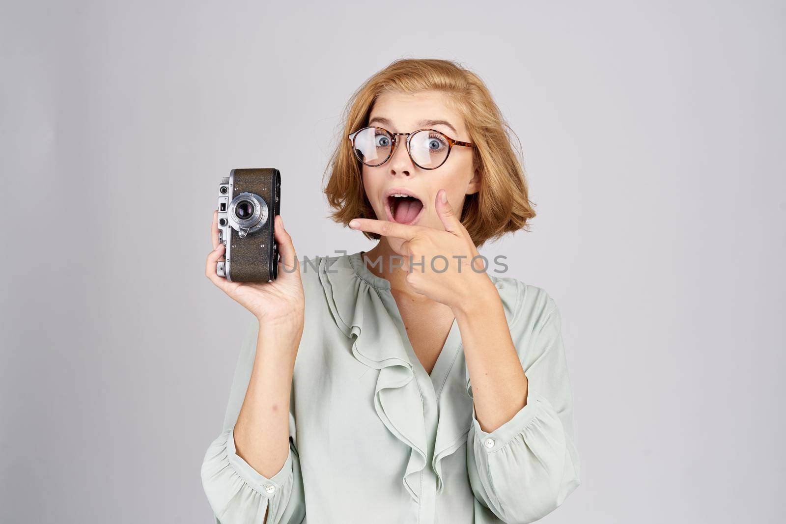 pretty blonde with phone technology communication studio. High quality photo