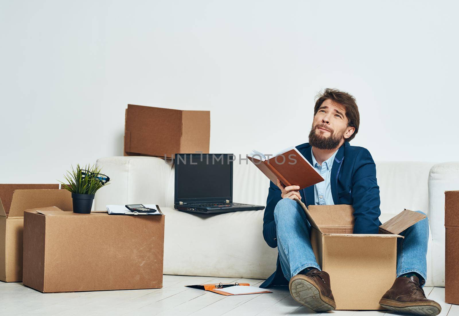 Business man boxes with new office things unpacking lifestyle. High quality photo