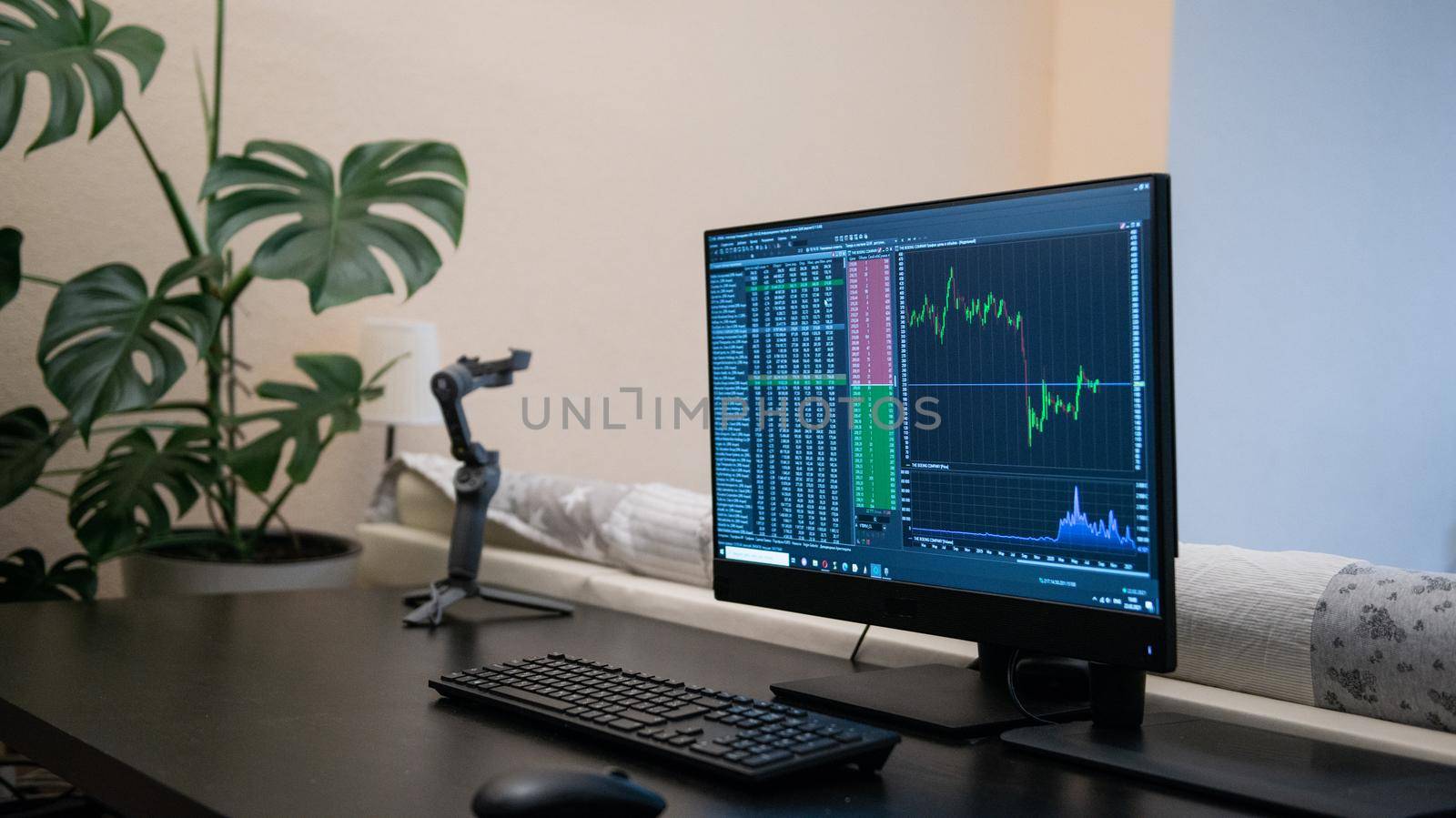 Computer screen with stock market changes, scrolling and analysing numbers at home work