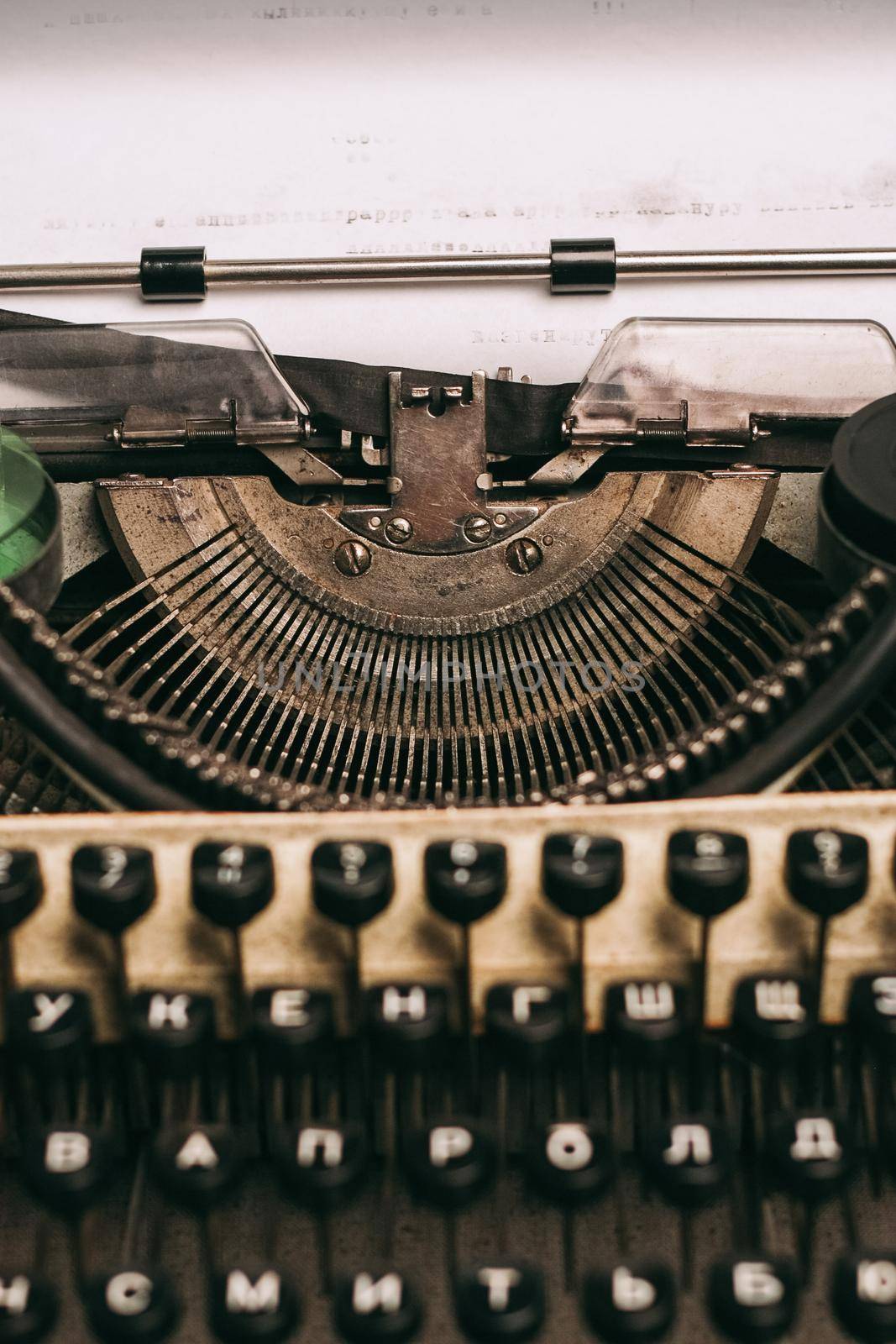 retro typewriter with keys vintage invention letters paper. High quality photo