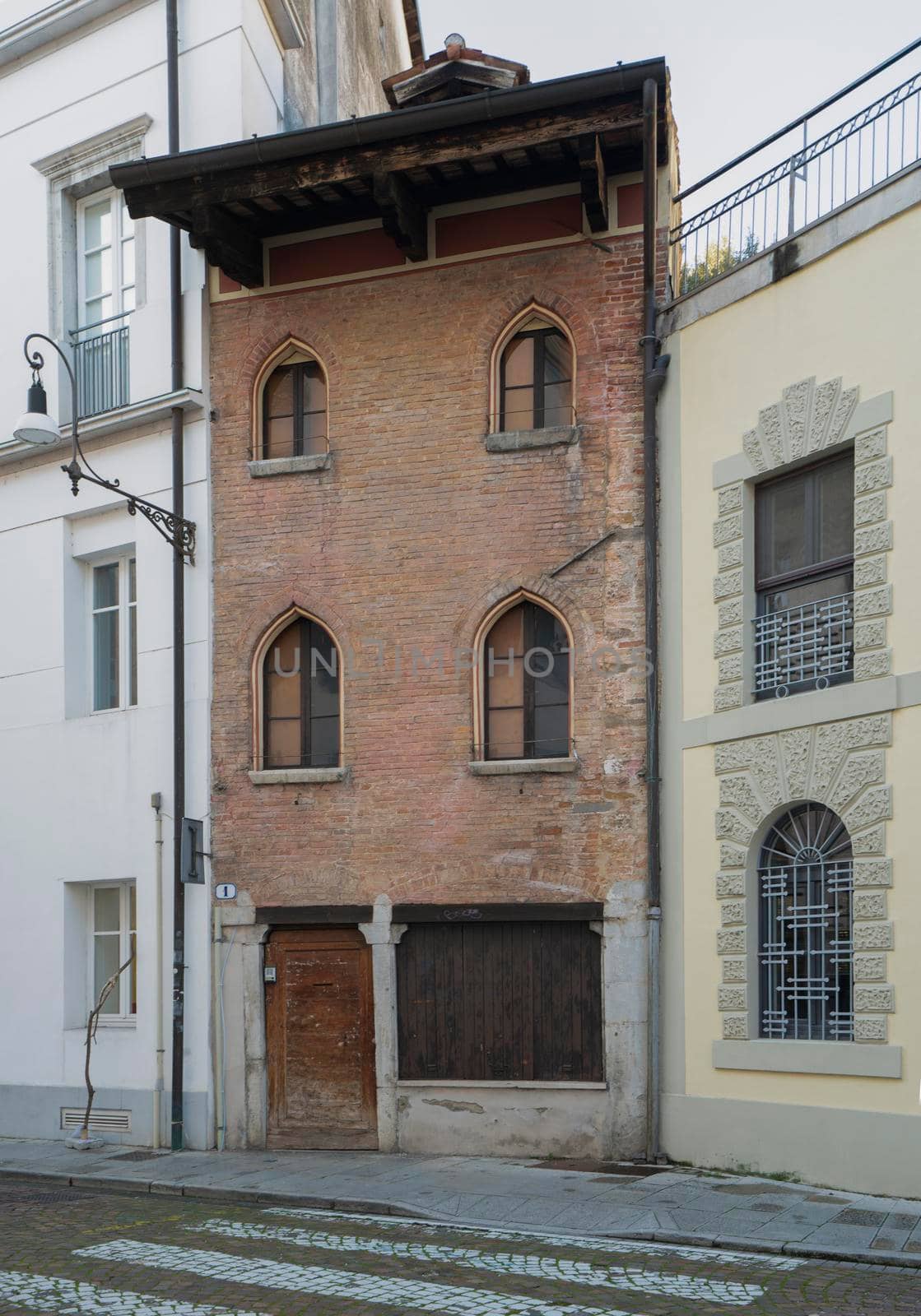 Udine, Italy. February 11, 2020.  view of the exterior of the oldest house in the city (built in 1300)