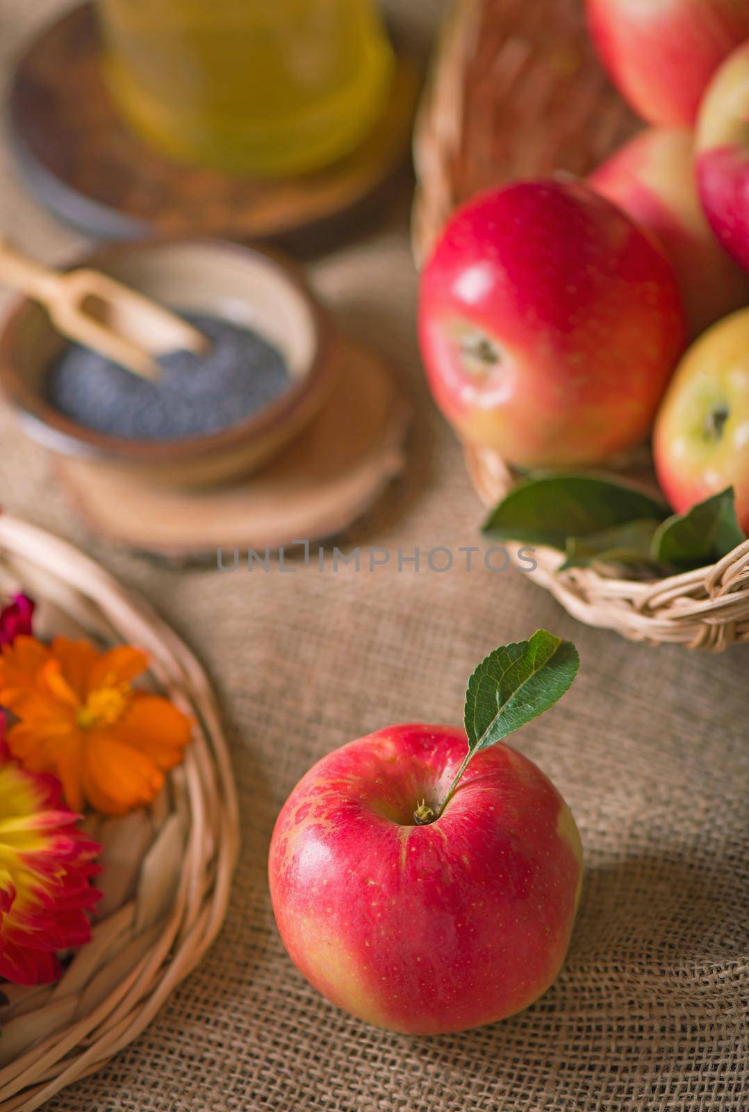 Apple and honey, traditional food of jewish New Year celebration, Rosh Hashana. Selective focus. Copyspace background by aprilphoto