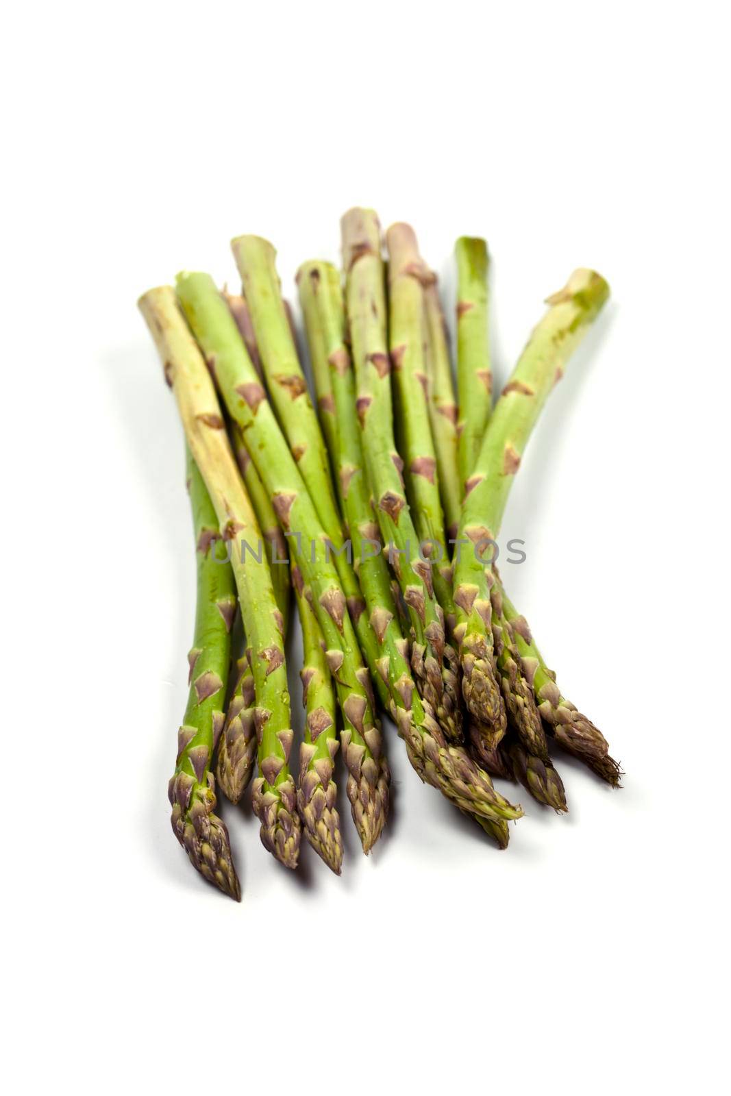 Bunch of fresh raw garden asparagus isolated on white background. Green spring vegetables. by marylooo